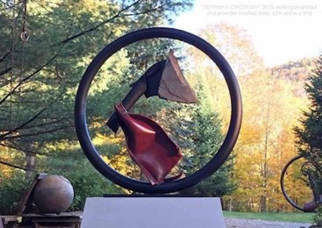 Sisyphean Circle LXIV by John Van Alstine.

Stone and metal, usually granite or slate and found object steel are central in my sculpture. The interaction of these materials is a major focus. On the most basic level the work is about the marriage of