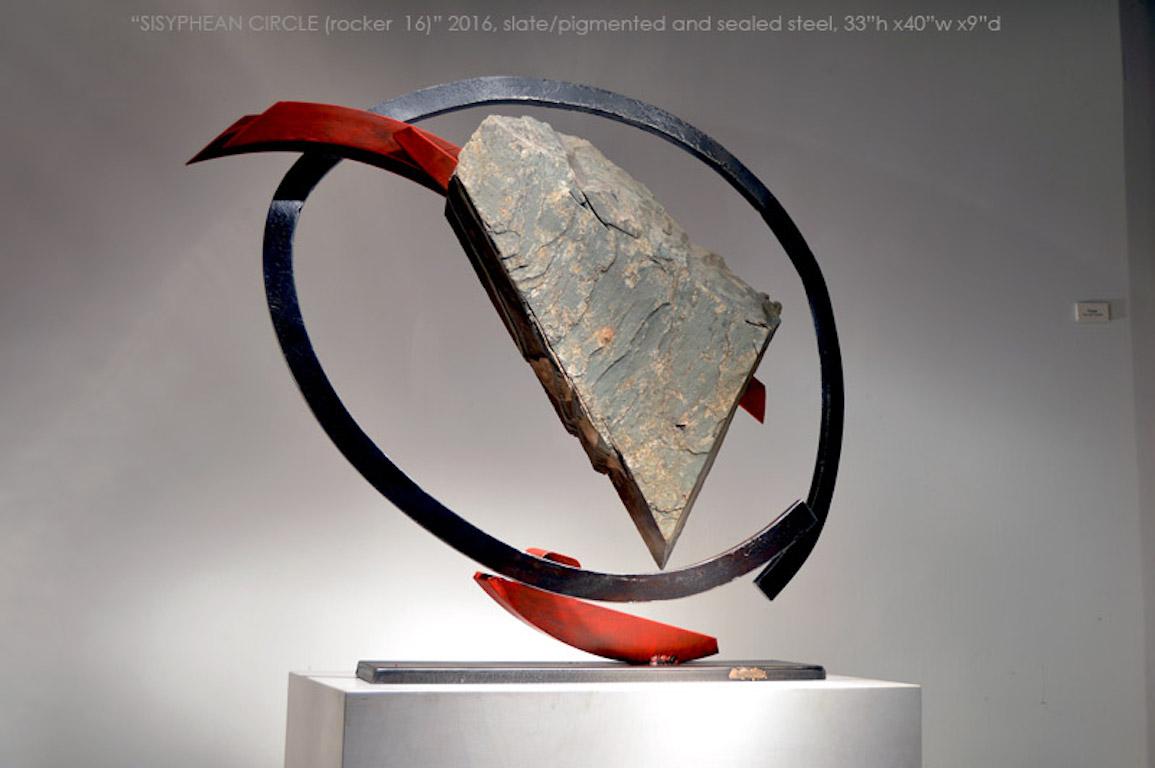 Sisyphean Circle (Rocker 16)
Slate/pigmented and sealed steel
33" (height) x 40" (width) x 9" (depth)

Stone and metal, usually granite or slate, and found object steel are central in my sculpture. The interaction of these materials is a major