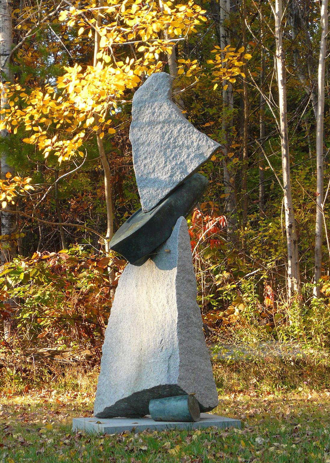 "Saxum Velum (stone sail)" by John Van Alstine
Granite and bronze

The sculpture of John Van Alstine beautifully, and powerfully, balances the union of stone and metal, while exploring the relationship of the purely natural and the man-made. He has