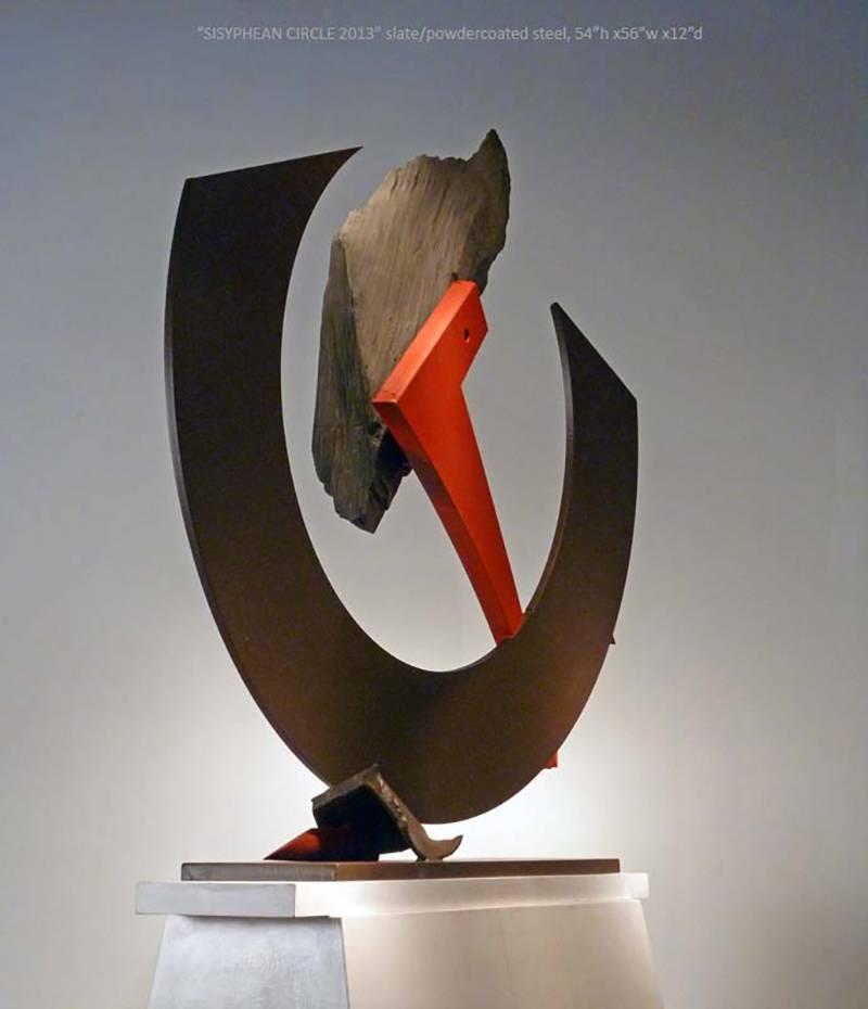 slate/ powder coated steel

Stone and metal, usually granite or slate and found object steel are central in my sculpture. The interaction of these materials is a major focus. On the most basic level the work is about the marriage of the natural with