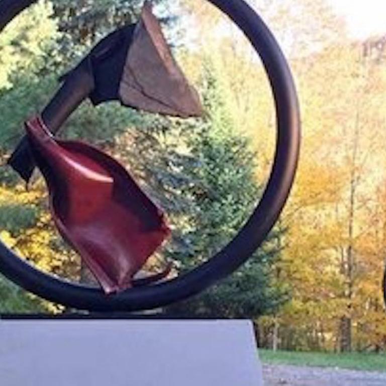 Sisyphean Circle LXIV by John Van Alstine.

Stone and metal, usually granite or slate and found object steel are central in my sculpture. The interaction of these materials is a major focus. On the most basic level the work is about the marriage of