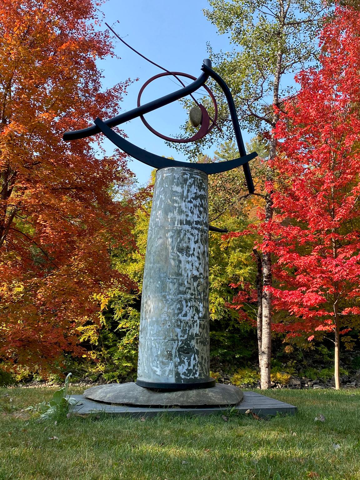 "Sisyphean Circle (tank top)" by John Van Alstine
Riverstone, stainless, galvanized, and powder-coated steel

The sculpture of John Van Alstine beautifully, and powerfully, balances the union of stone and metal, while exploring the relationship of