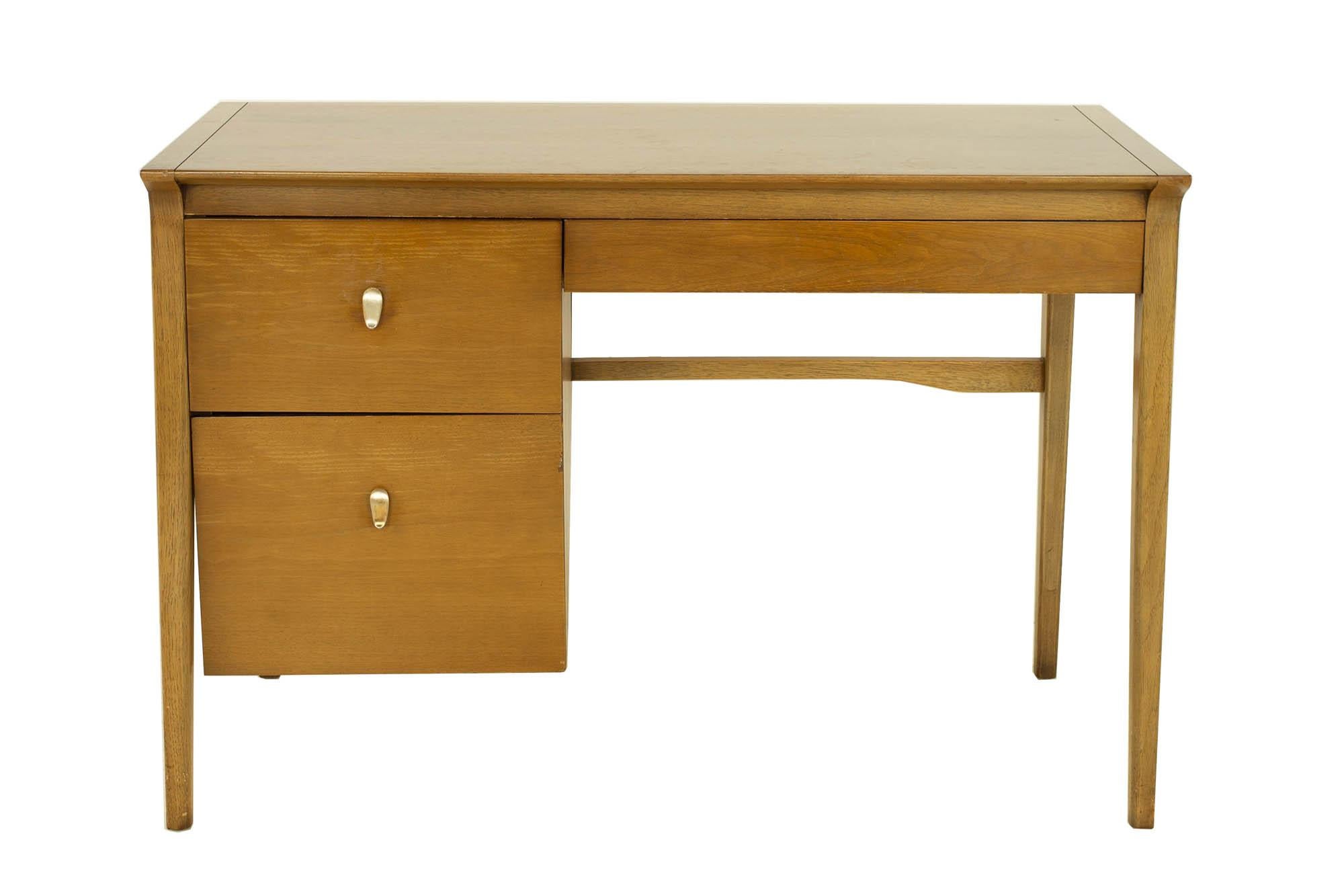 John Van Koert for Drexel mid century desk

This desk measures: 44 wide x 20.75 deep x 29.75 inches high, with a chair clearance of 24.25 inches

?All pieces of furniture can be had in what we call restored vintage condition. That means the