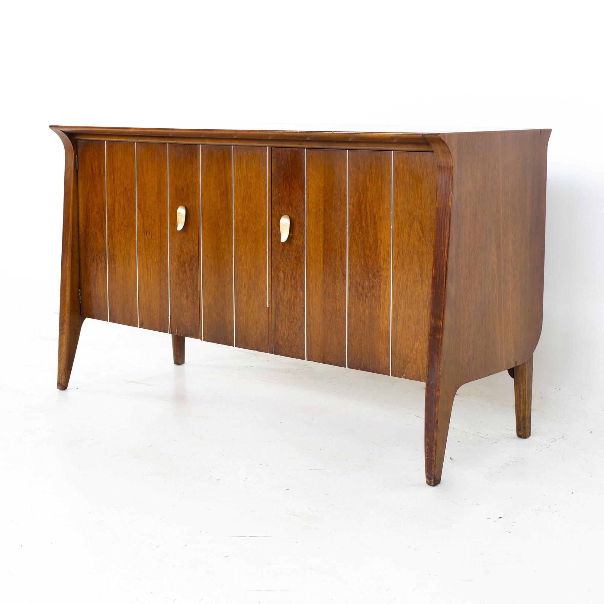 John Van Koert for Drexel Profile Mid Century Small Sideboard Buffet Credenza
Credenza measures: 48 wide x 18 deep x 28 inches high

All pieces of furniture can be had in what we call restored vintage condition. That means the piece is restored upon