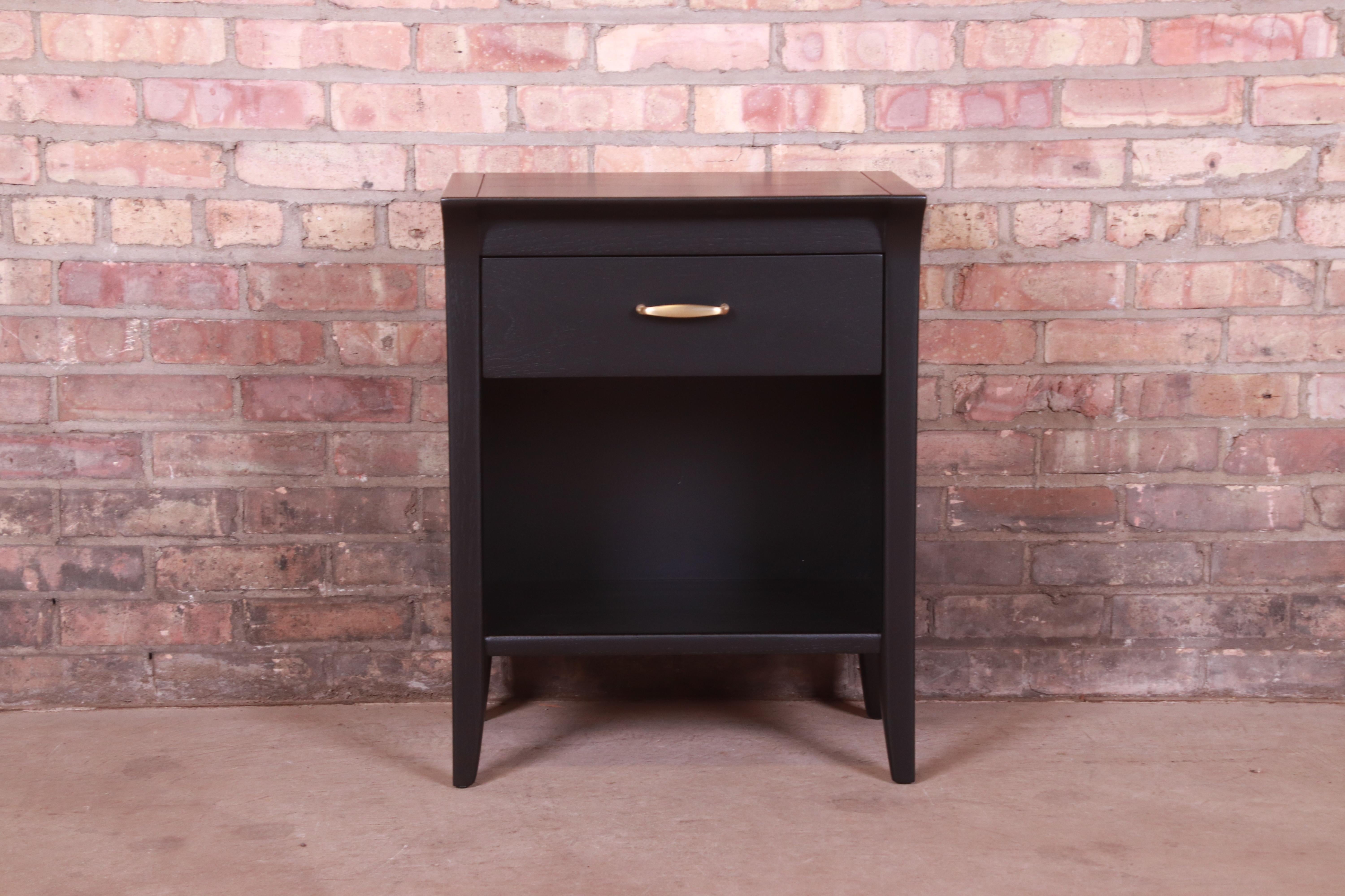 A gorgeous Mid-Century Modern nightstand

By John Van Koert for Drexel, 