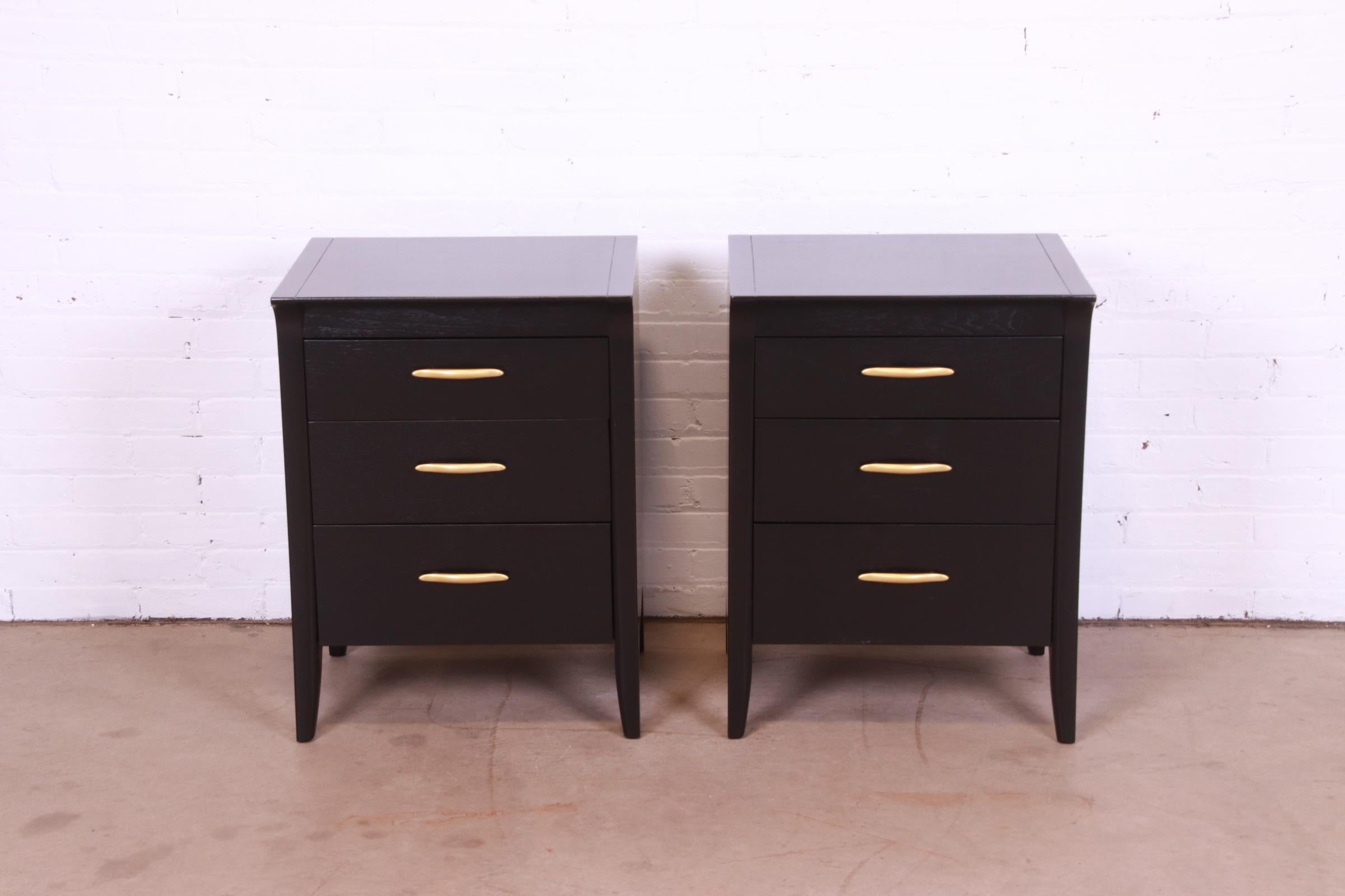 A gorgeous pair of Mid-Century Modern three-drawer bachelor chests or nightstands

By John Van Koert for Drexel, 