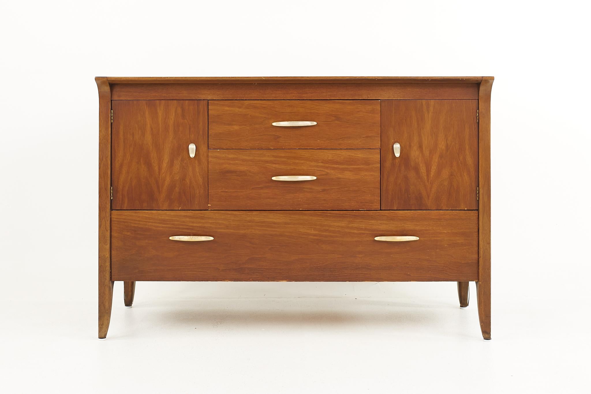 John Van Koert for Drexel profile mid century sideboard Credenza

This credenza measures: 48 wide x 21 deep x 32 inches high

All pieces of furniture can be had in what we call restored vintage condition. That means the piece is restored upon
