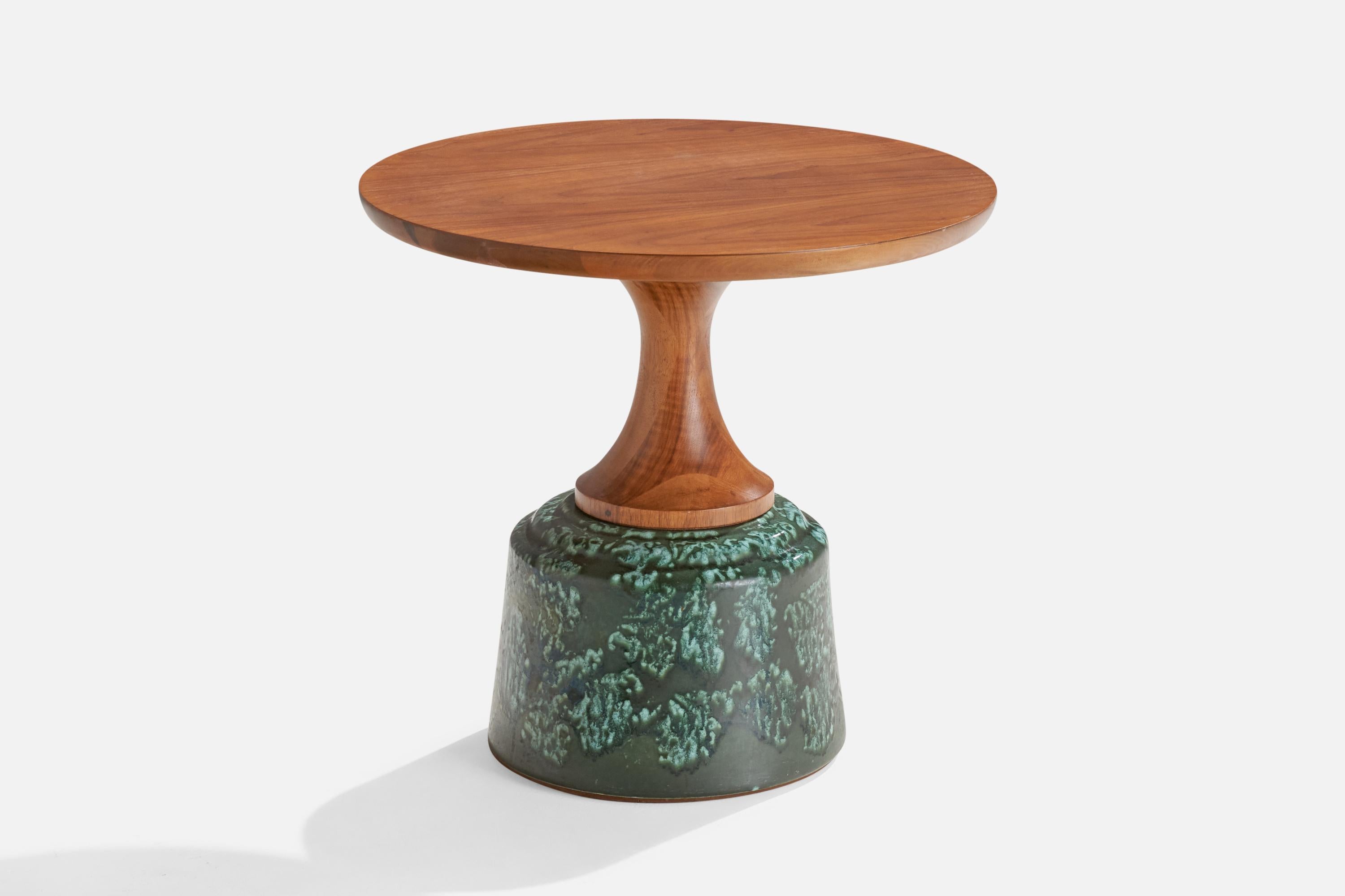 A walnut and green-glazed ceramic side table, designed by John Van Koert and produced by Drexel, USA, c. 1950s.
