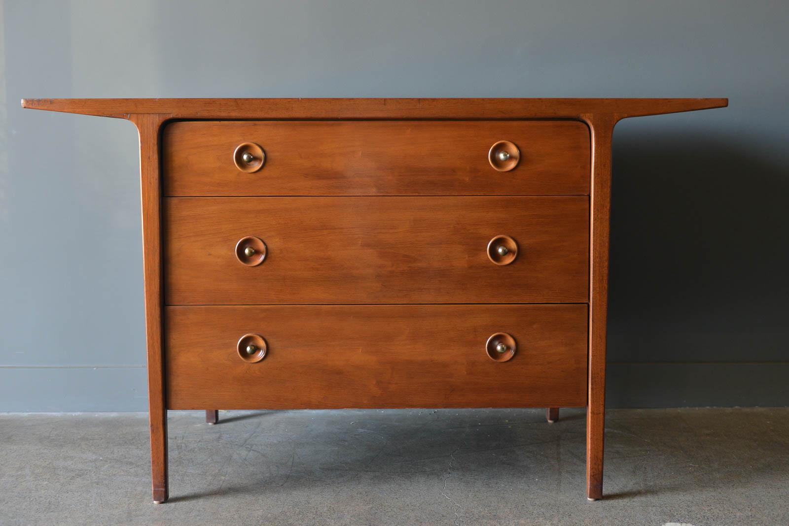 John Van Koert Span chest, circa 1960. Model 8007 for the counterpoint line for Drexel, this chest is made of mahogany and cherry with solid brass hardware. Very unique design, this chest is in good vintage condition with only slight wear and
