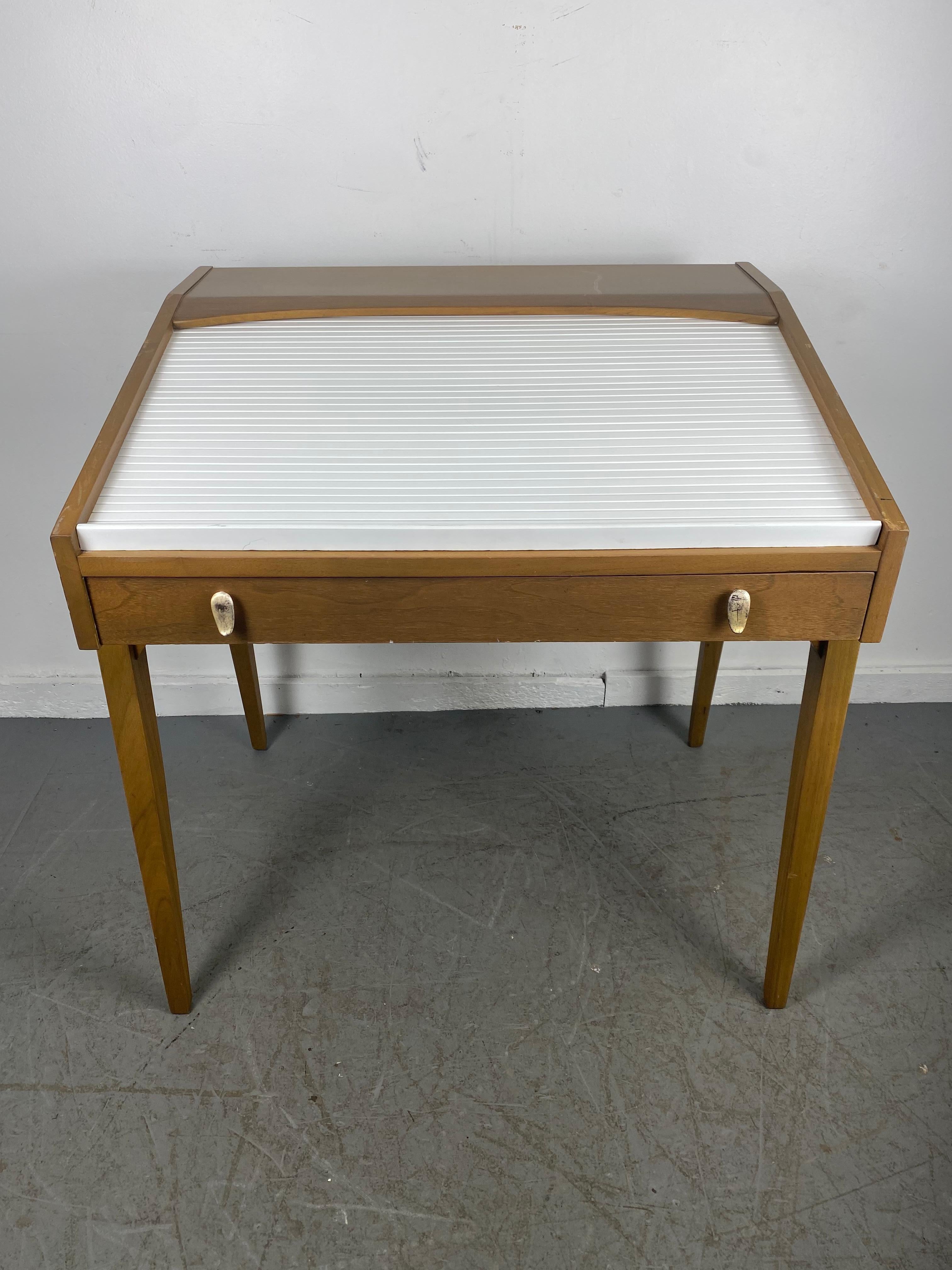 Designer: John Van Koert
Manufacturer: Drexel “Profile”
Period/Style: Mid Century Modern
Country: United States
Date: 1950's.................. WHITE LACQUER TAMBOUR DOOR ROOL TOP..,, Hand delivery avail to New York City or anywhere en route from