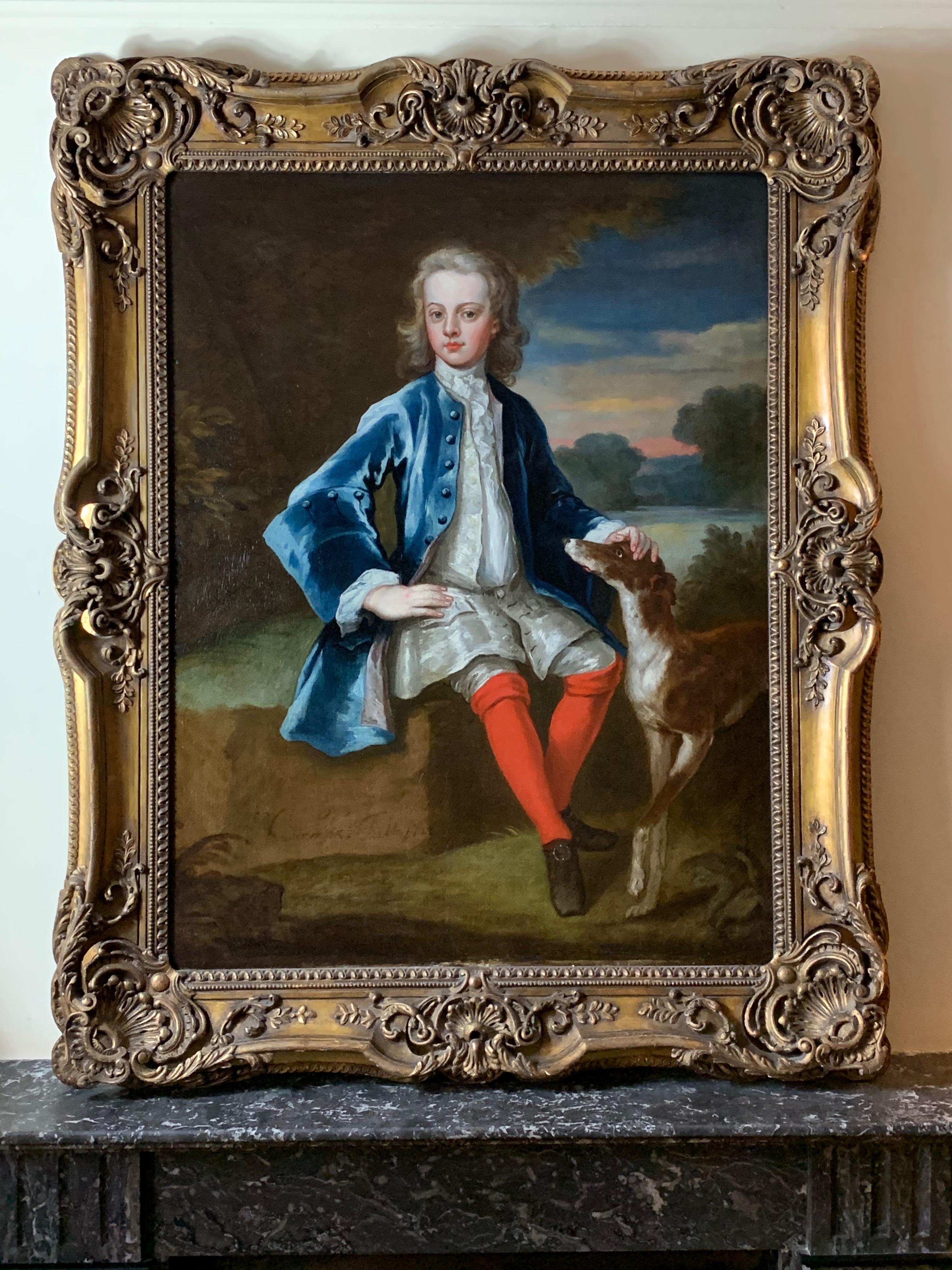 A charming and and highly decorative early 18th Century English portrait of an elegant young gentleman and his greyhound, within  an extensive landscape. Signed by the artist ‘John Vanderbank 1726’.

The attractive sitter is pictured full length