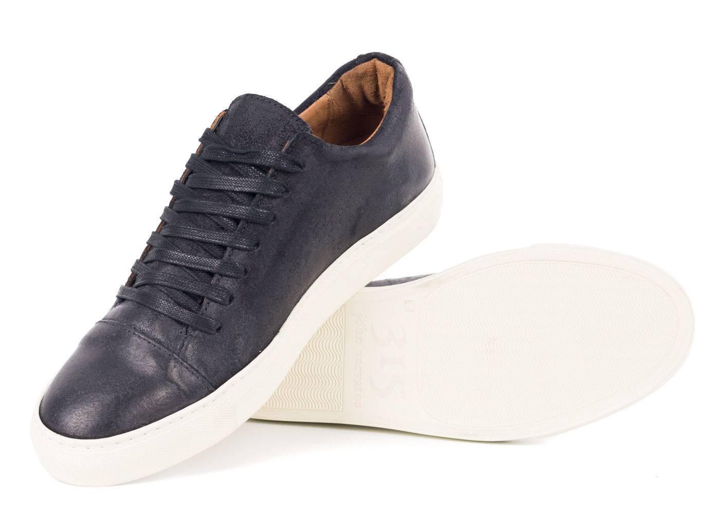 John Varvatos continues to bridge artisal craftsmanship and relaxed luxury for your everyday wear. Meet the 315 Reed sneakers, handcrafted in Portugal from calfskin that has been processed and brushed to a rustic worn texture with a simple lace