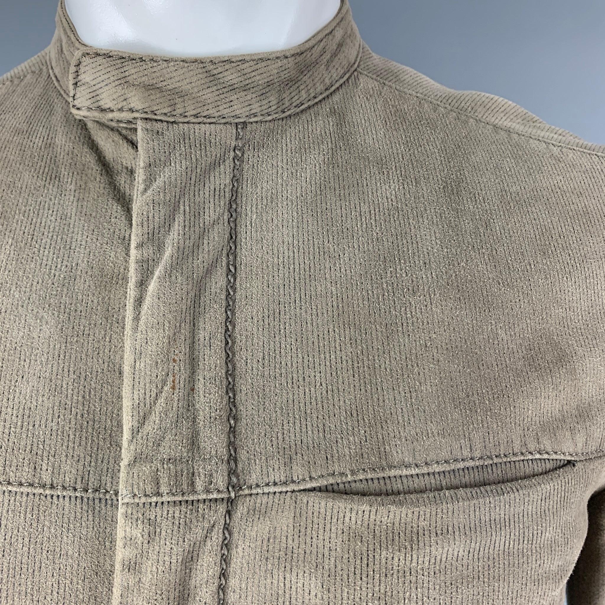 JOHN VARVATOS olive green zip up jacket comes in 100% goat suede featuring a mandarin collar, pinstripes, and welt pockets. Very Good Pre-Owned Condition. 

Marked:   44 

Measurements: 
 
Shoulder: 16.5 inches Chest: 38 inches Sleeve: 24.5 inches