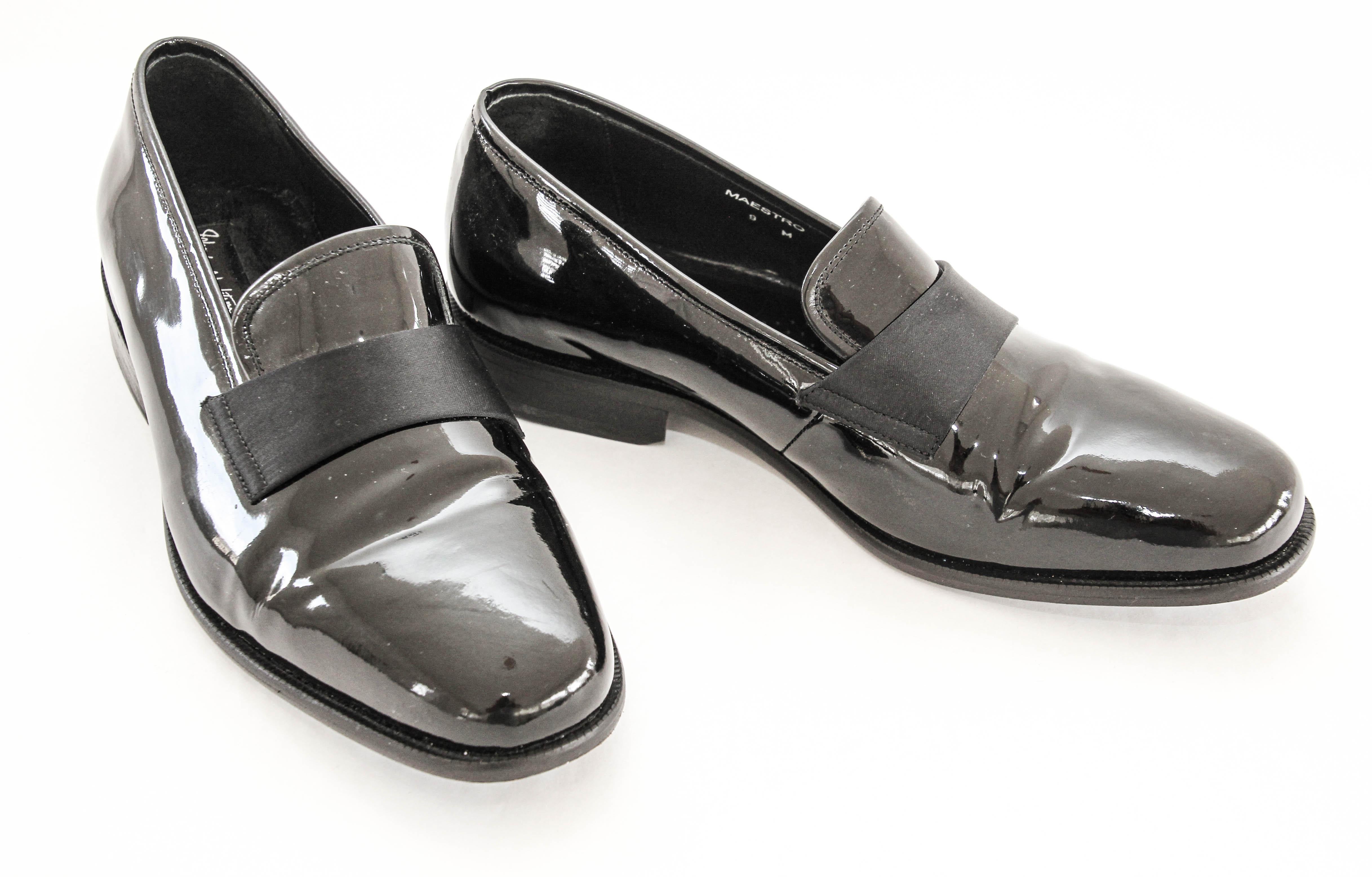 John Varvatos presents the Maestro Men's Slip-On Dress Loafers in Black Patent Leather, size 9 M.
Crafted by JOHN VARVATOS, these black Maestro loafers embody timeless elegance. 
The lightweight and comfortable slip-on design complements any suit,