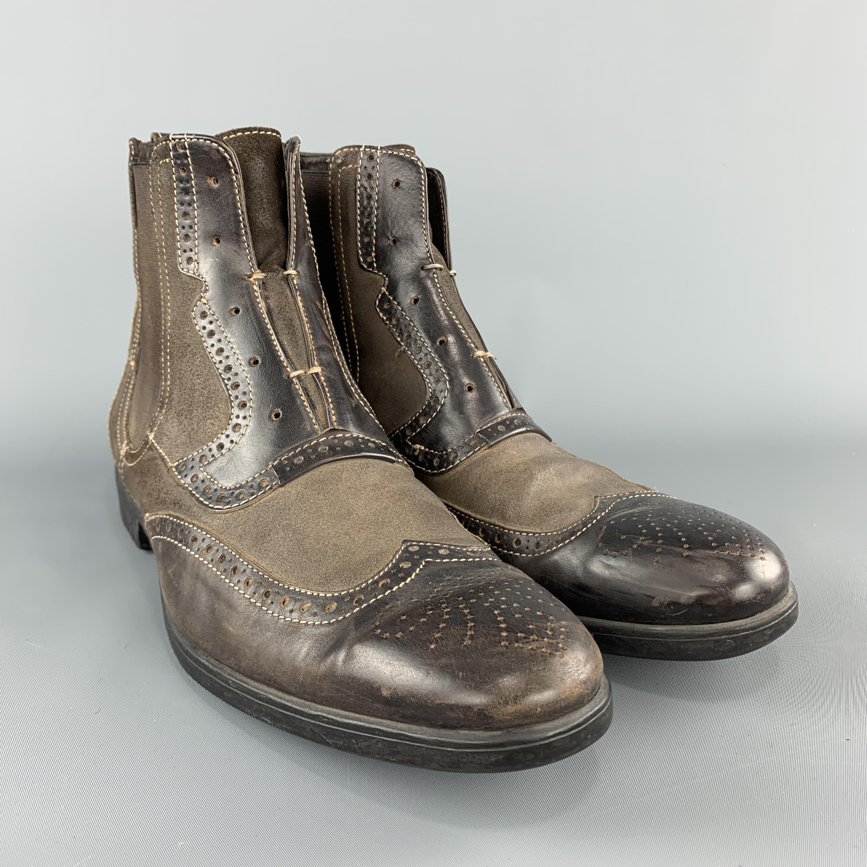 JOHN VARVATOS chelsea boots come in taupe matte leather with brown panels, wingtip toe, rubber sole,  and stretch sides. Hand Made in Italy.

Good Pre-Owned Condition.
Marked: US 11.5

Outsole: 12.5 x 4 in.