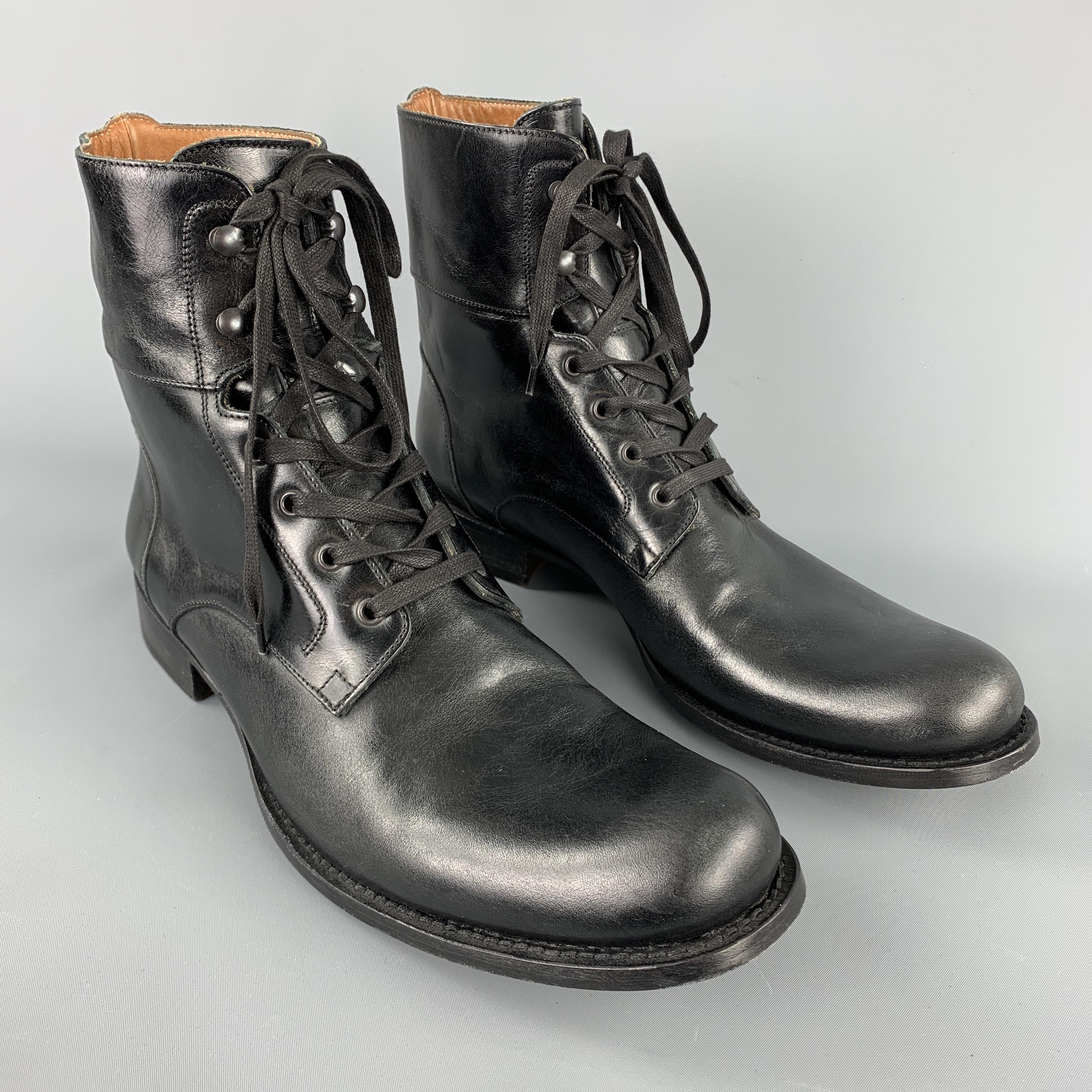 JOHN VARVATOS lace up ankle convert boots comes in a solid black leather material, with a leather insole and outsole. With box. Hand made in Italy.

Excellent Pre-Owned Condition.
Marked: US 12

Measurements:

Outsole: 13 x 4.5 in. 
Height: 8 in.