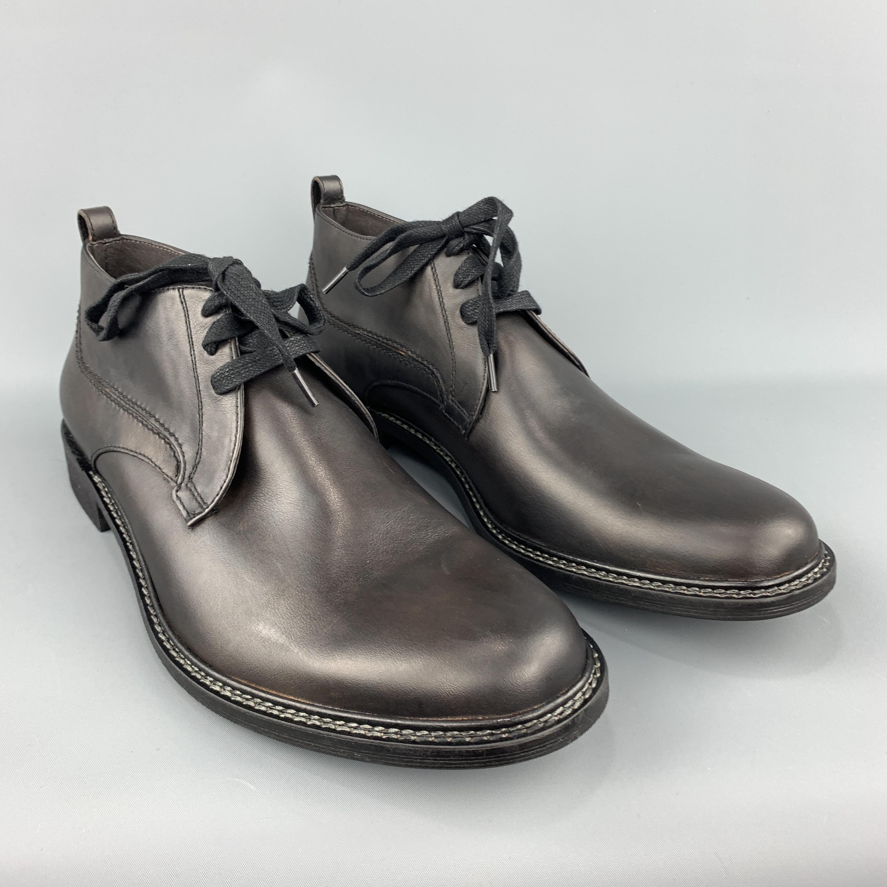 JOHN VARVATOS ankle boots come in smooth black leather with a rubber sole. With box.
 
Excellent Pre-Owned Condition.
Marked: 12
 
Outsole: 13 x 5 in.
