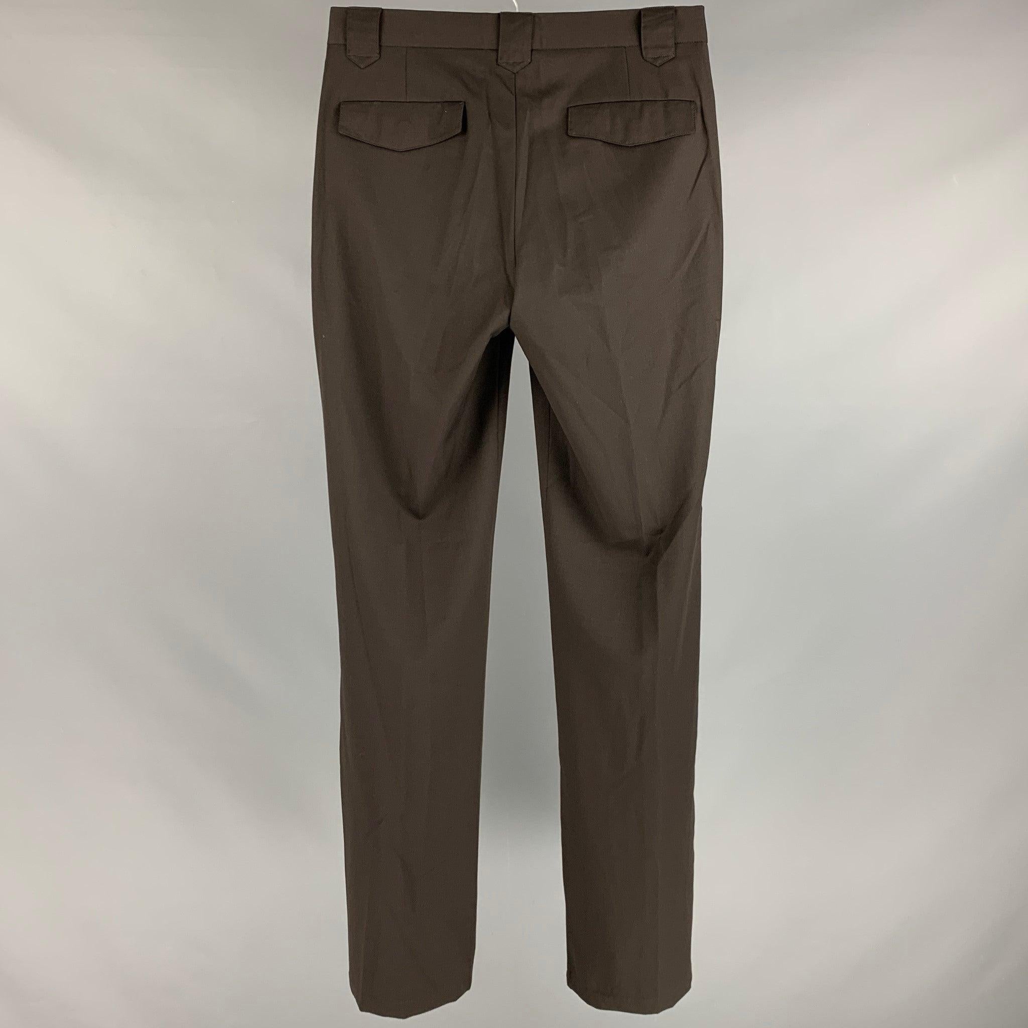 JOHN VARVATOS
dress pants in a brown wool fabric featuring a regular fit, flat front style, and zipper fly closure.Excellent Pre-Owned Condition. 

Marked:  46 

Measurements: 
 Waist: 30 inches Rise: 9 inches Inseam: 34 inches 
 
 
Reference: