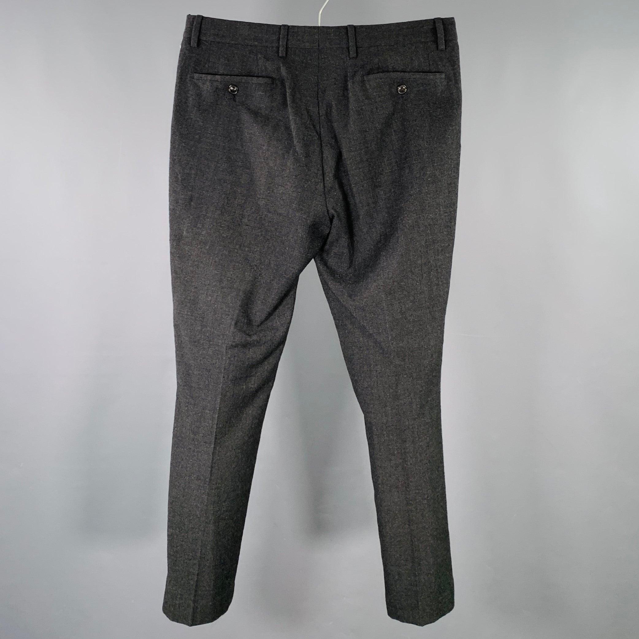 JOHN VARVATOS dress pants
in a heather grey wool featuring a flat front style, straight leg, and zip fly closure. Made in Portugal.Excellent Pre-Owned Condition. 

Marked:   IT 48 

Measurements: 
  Waist: 32 inches Rise: 9.5 inches Inseam: 28