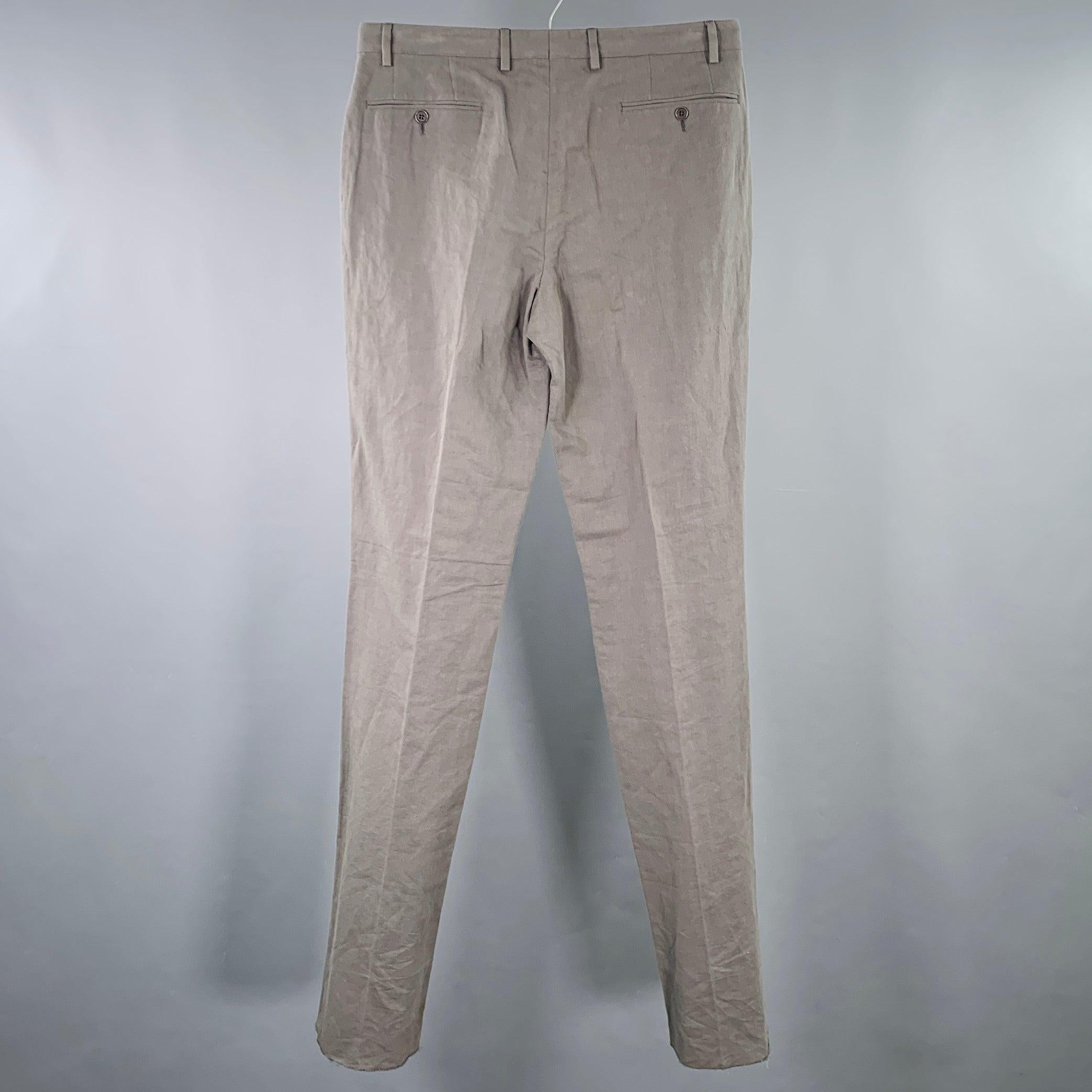 JOHN VARVATOS casual pants
in a grey linen cotton woven blend featuring a flat front style, straight leg, and zip fly closure. Made in Portugal. Hem has been left unfinished in order to tailor to your perfect fit.New with Tags. 

Marked:   IT 48