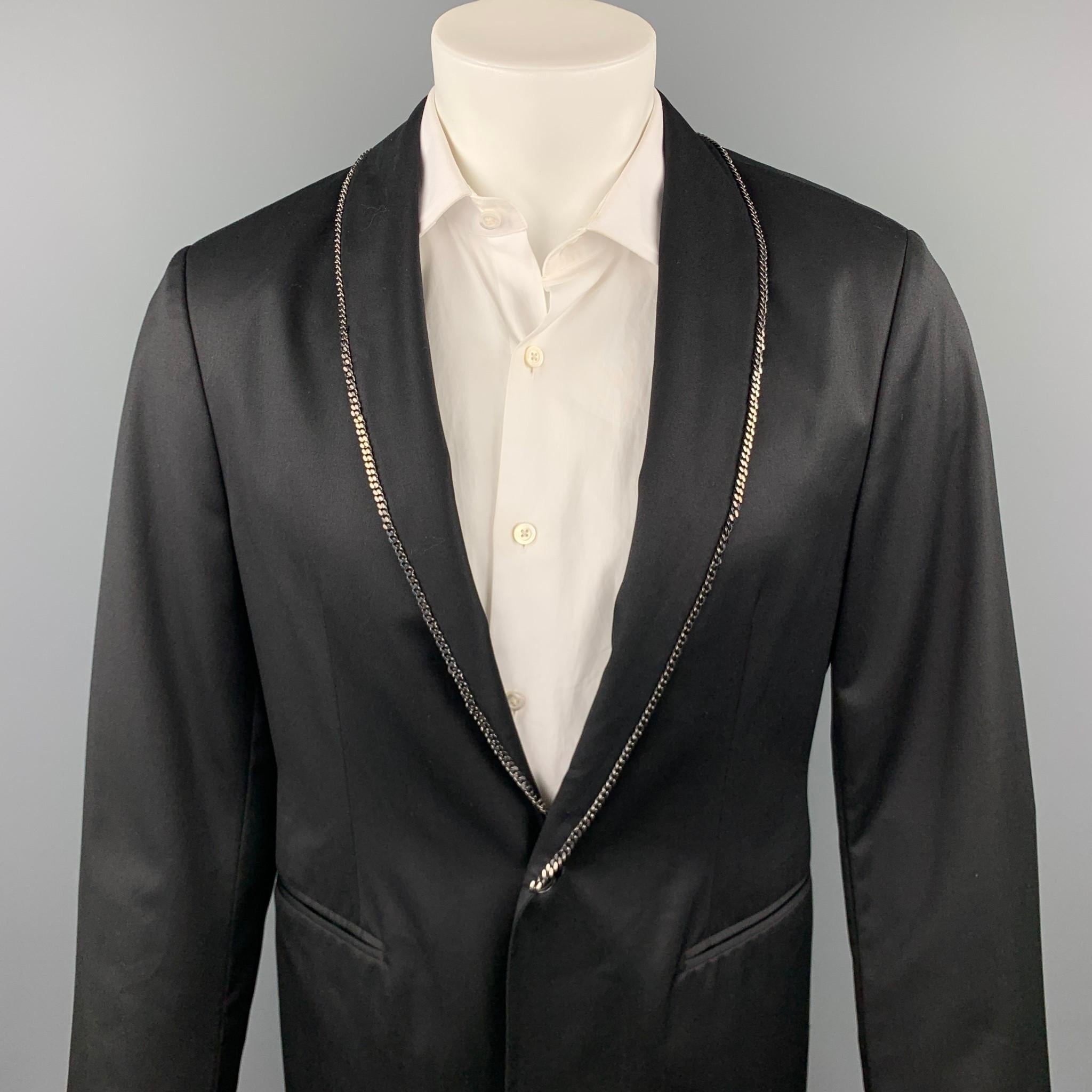 JOHN VARVATOS sport coat comes in a black wool with a half liner featuring a shawl collar, chain trim, slit pockets, and a single button closure. Made in Italy.

Very Good Pre-Owned Condition.
Marked: IT 48

Measurements:

Shoulder: 18 in. 
Chest: