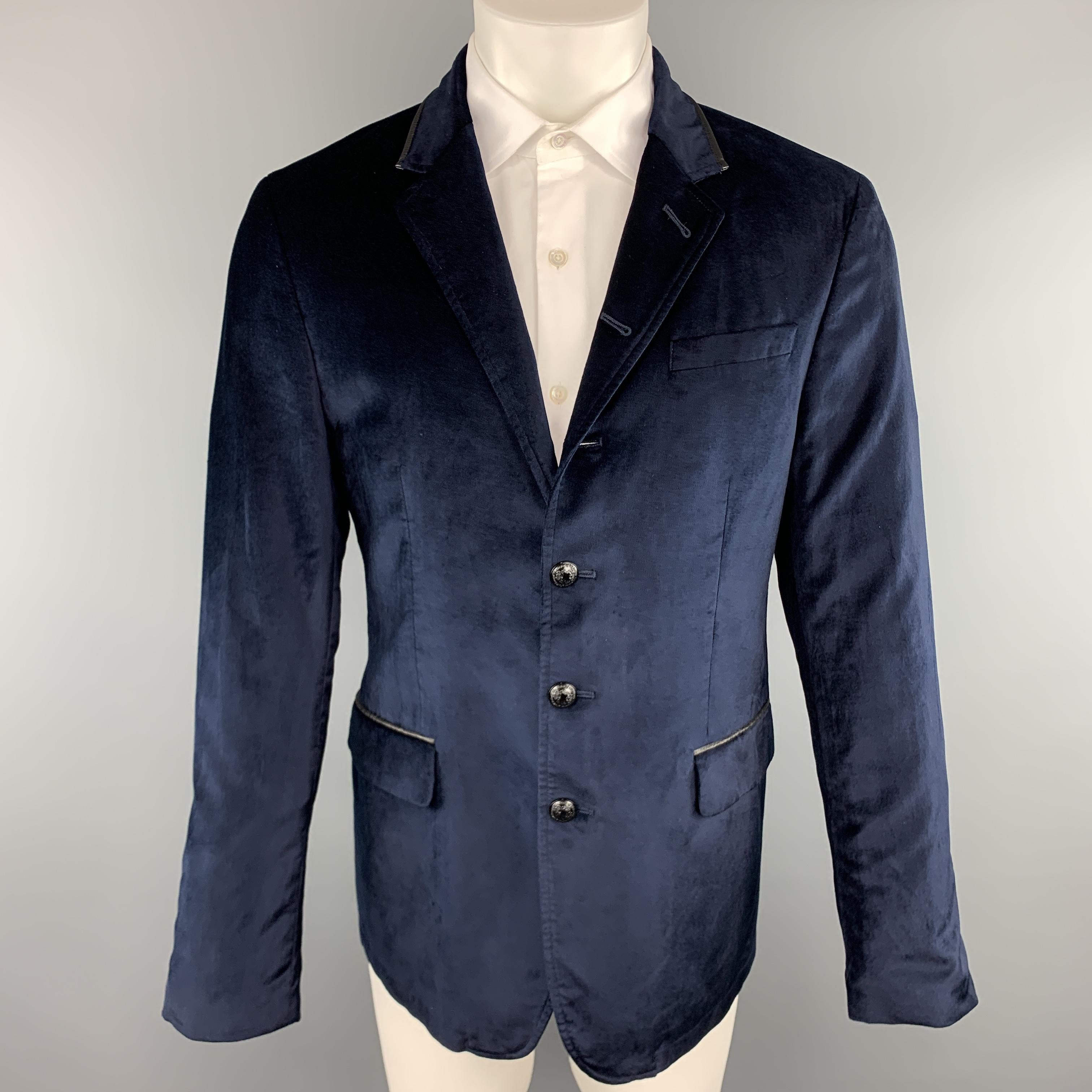 JOHN VARVATOS * USA military style sport coat comes in navy velvet with a high collar, single breasted, six button front with black crest buttons,  and leather trim. 

Very Good Pre-Owned Condition.
Marked: 40

Measurements:

Shoulder: 18 in.
Chest: