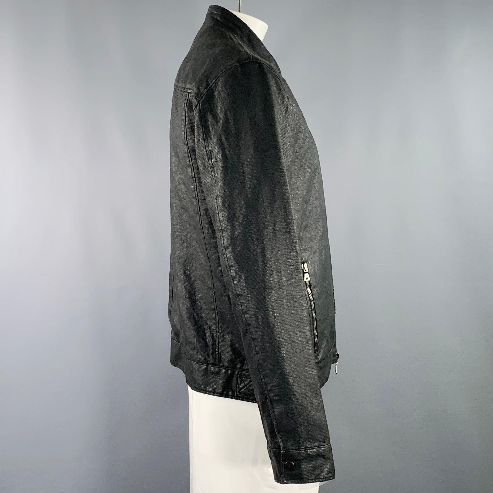 JOHN VARVATOS jacket
in a
black linen cotton woven fabric featuring three zip pockets with silver tone metal hardware, and zip up closure. Very Good Pre-Owned Condition. Minor signs of wear on cuffs. 

Marked:   IT 54 

Measurements: 
 
Shoulder: