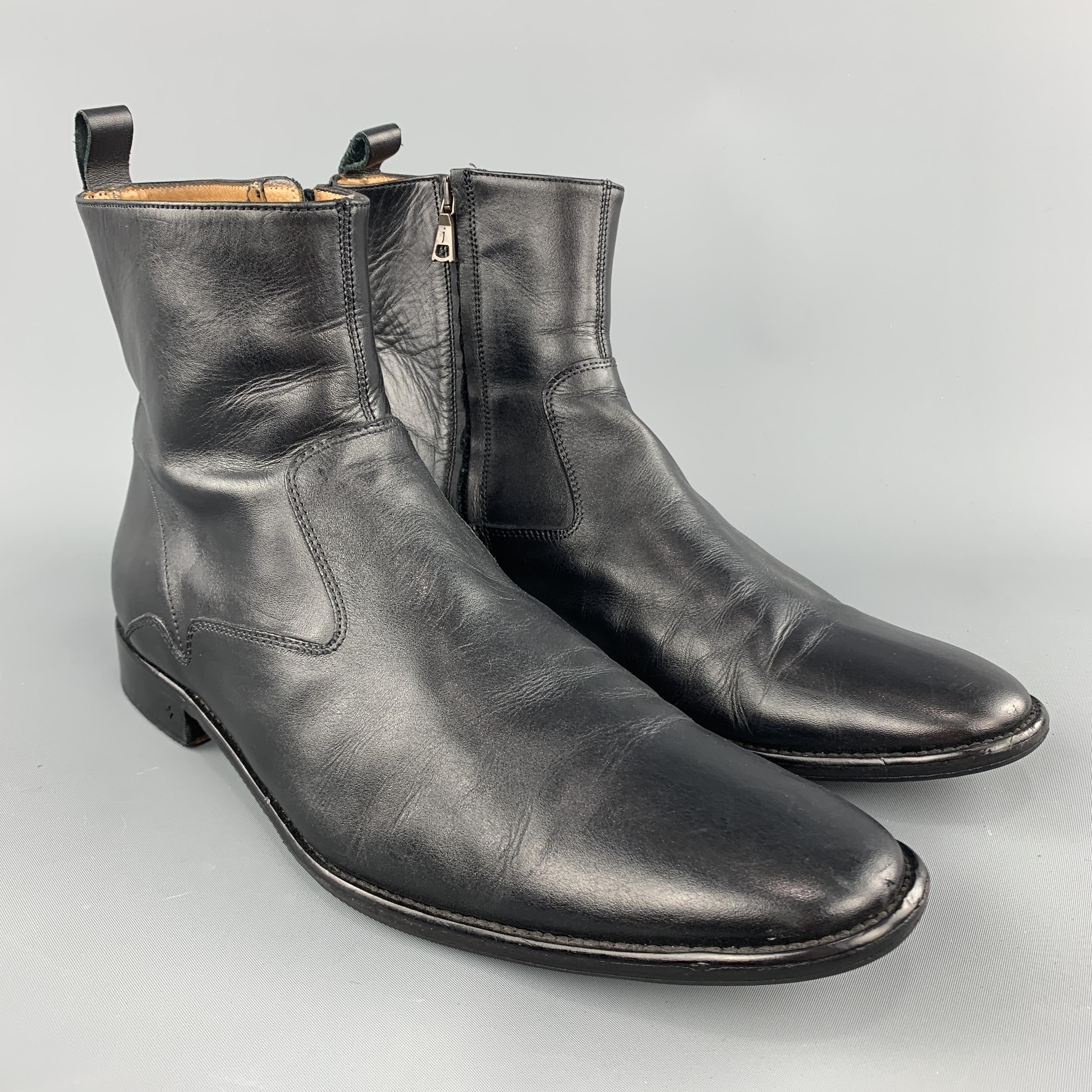 JOHN VARVATOS ankle boots come in smooth black leather with rounded point toe and inner zip closure. Hand Made in Italy.
 
Excellent Pre-Owned Condition.
Marked: 9.5
 
Outsole: 12.5 x 4 in.