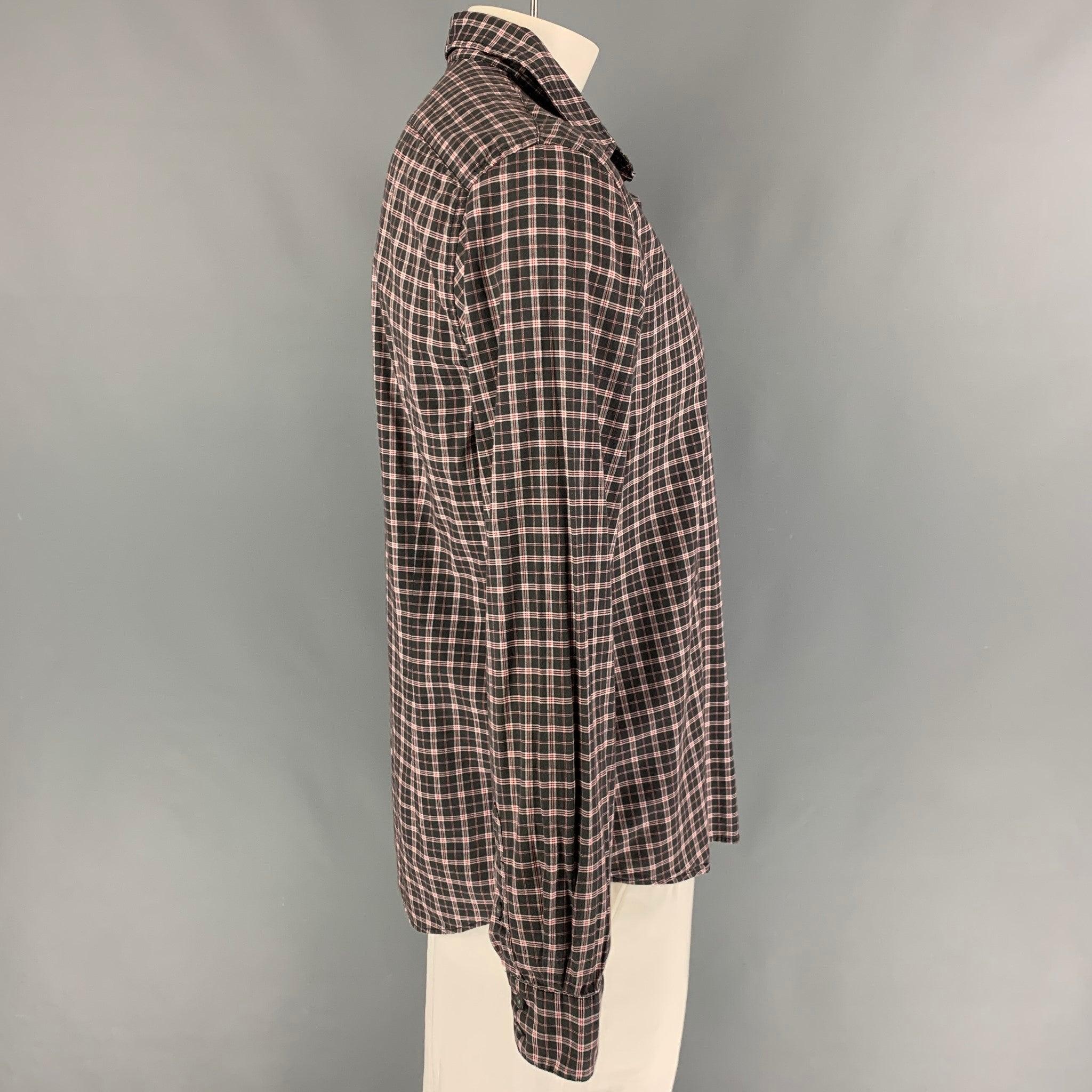 JOHN VARVATOS long sleeve shirt comes in a black & red plaid cotton featuring a spread collar and a button up closure.
Very Good
Pre-Owned Condition. 

Marked:   L  

Measurements: 
 
Shoulder: 18.5 inches  Chest: 44 inches  Sleeve: 25.5 inches 