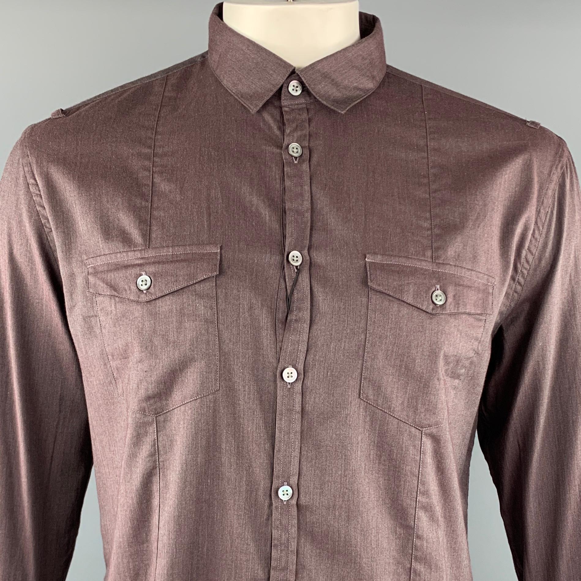 JOHN VARVATOS long sleeve shirt comes in a brown cotton featuring a button up style, patch pockets, shoulder loop details, and a spread collar.

New With Tags.
Marked: L

Measurements:

Shoulder: 18.5 in.
Chest: 45 in.
Sleeve: 26.5 in.
Length: 26 in,