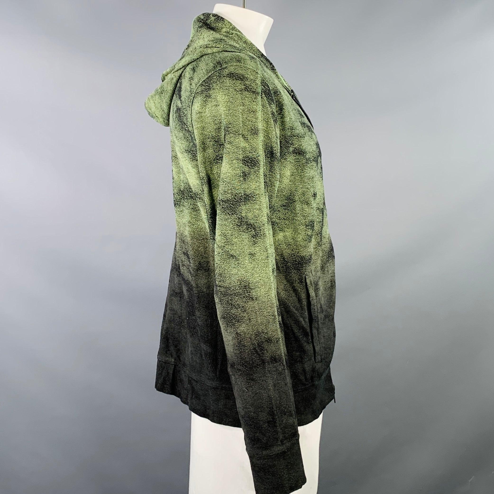 JOHN VARVATOS jacket
in a green and black woven cotton featuring an abstract woven ombre design, hooded style, and zip up closure.Excellent Pre-Owned Condition. 

Marked:   L 

Measurements: 
 
Shoulder: 21 inches Chest: 46 inches Sleeve: 25 inches