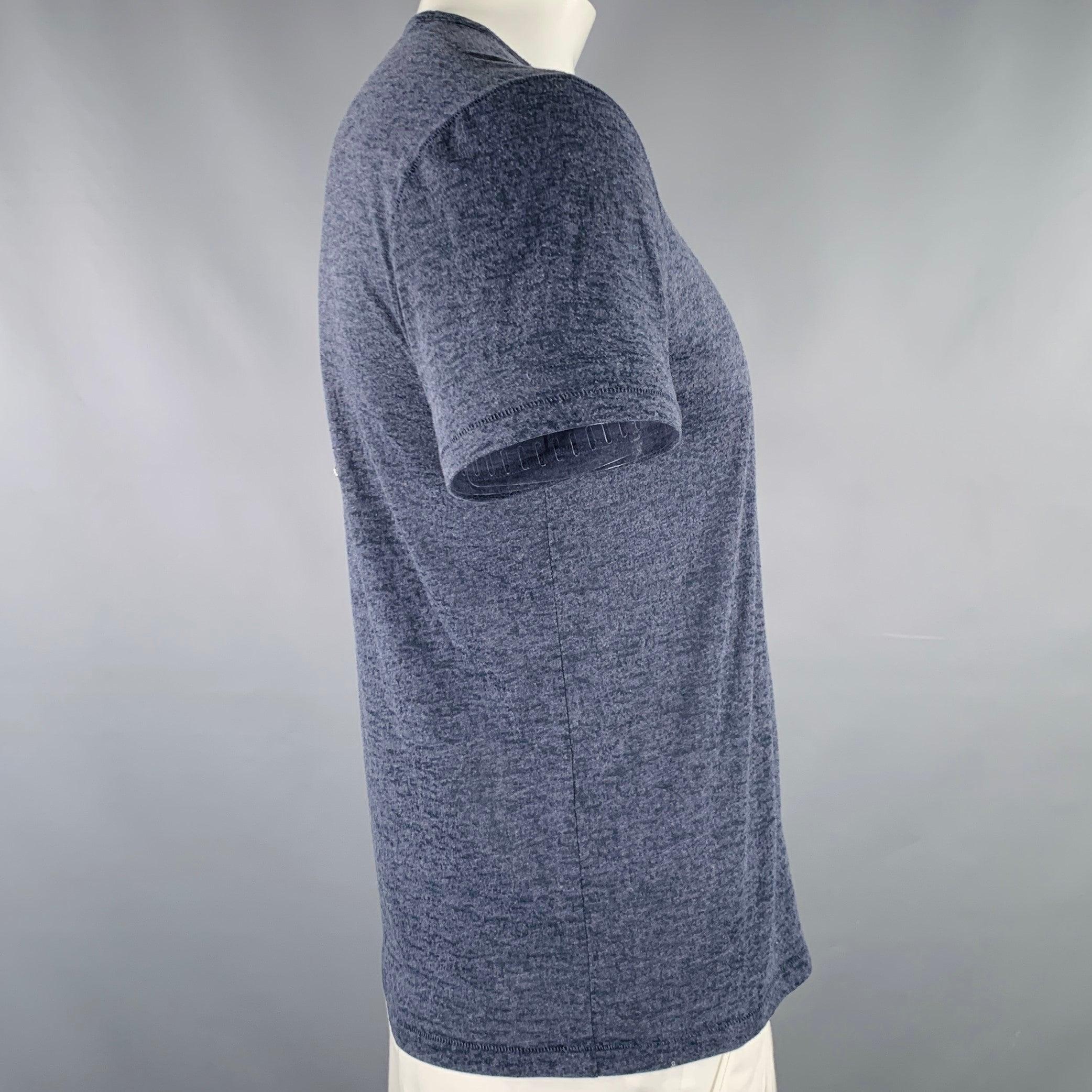 JOHN VARVATOS * U.S.A. t-shirt
in a heather grey cotton blend jersey featuring V-neck and one pocket. Excellent Pre-Owned Condition. 

Marked:   L 

Measurements: 
 
Shoulder: 18 inches Chest: 43 inches Sleeve: 7.5 inches Length: 25.5 inches 
  
  
