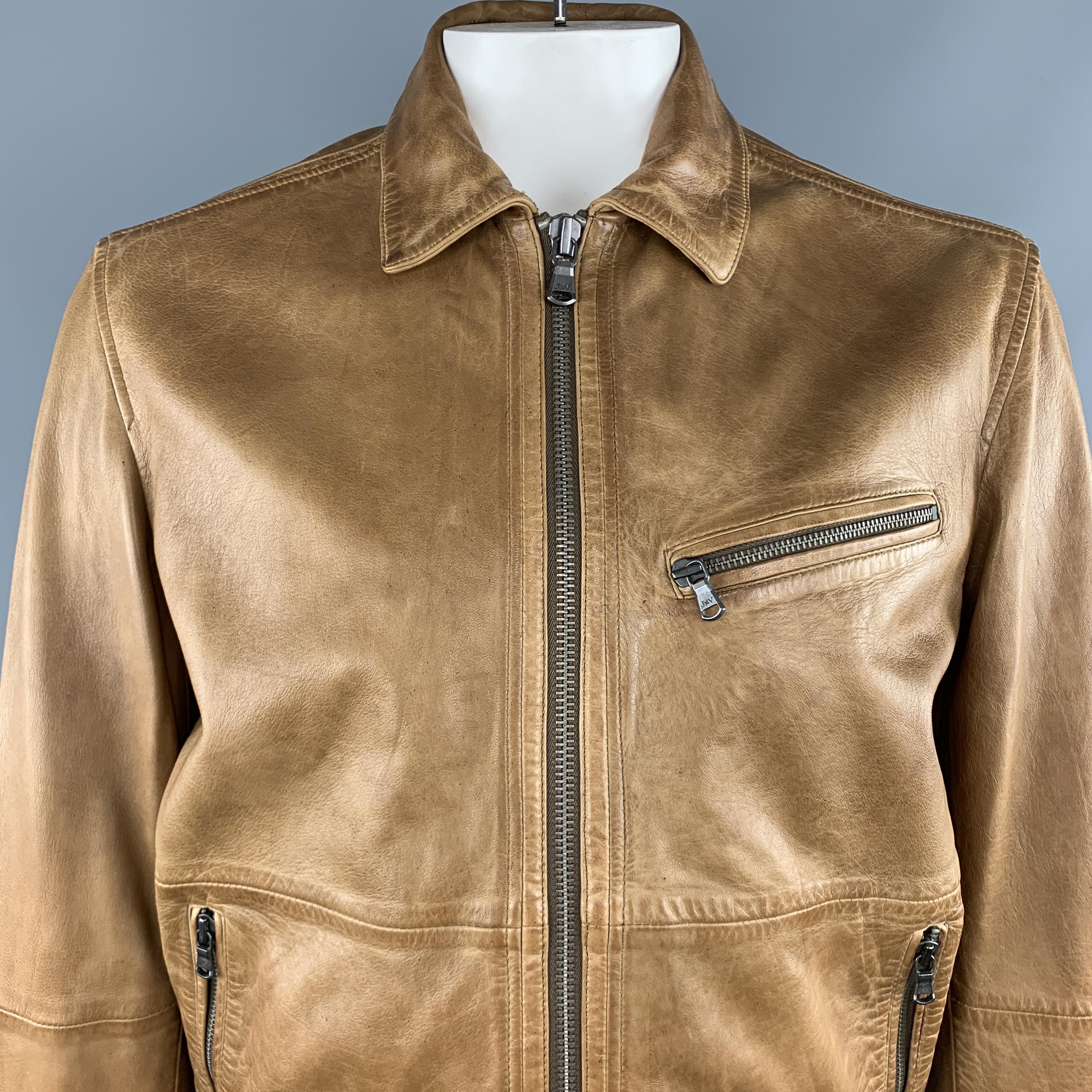 JOHN VARVATOS jacket comes in distressed tan sheep skin leather with a pointed collar, zip up front, and zip pockets. Never worn.

Never Worn.
Marked: L

Measurements:

Shoulder: 18.5 in.
Chest: 46 in.
Sleeve: 27 in.
Length:  28 in.

