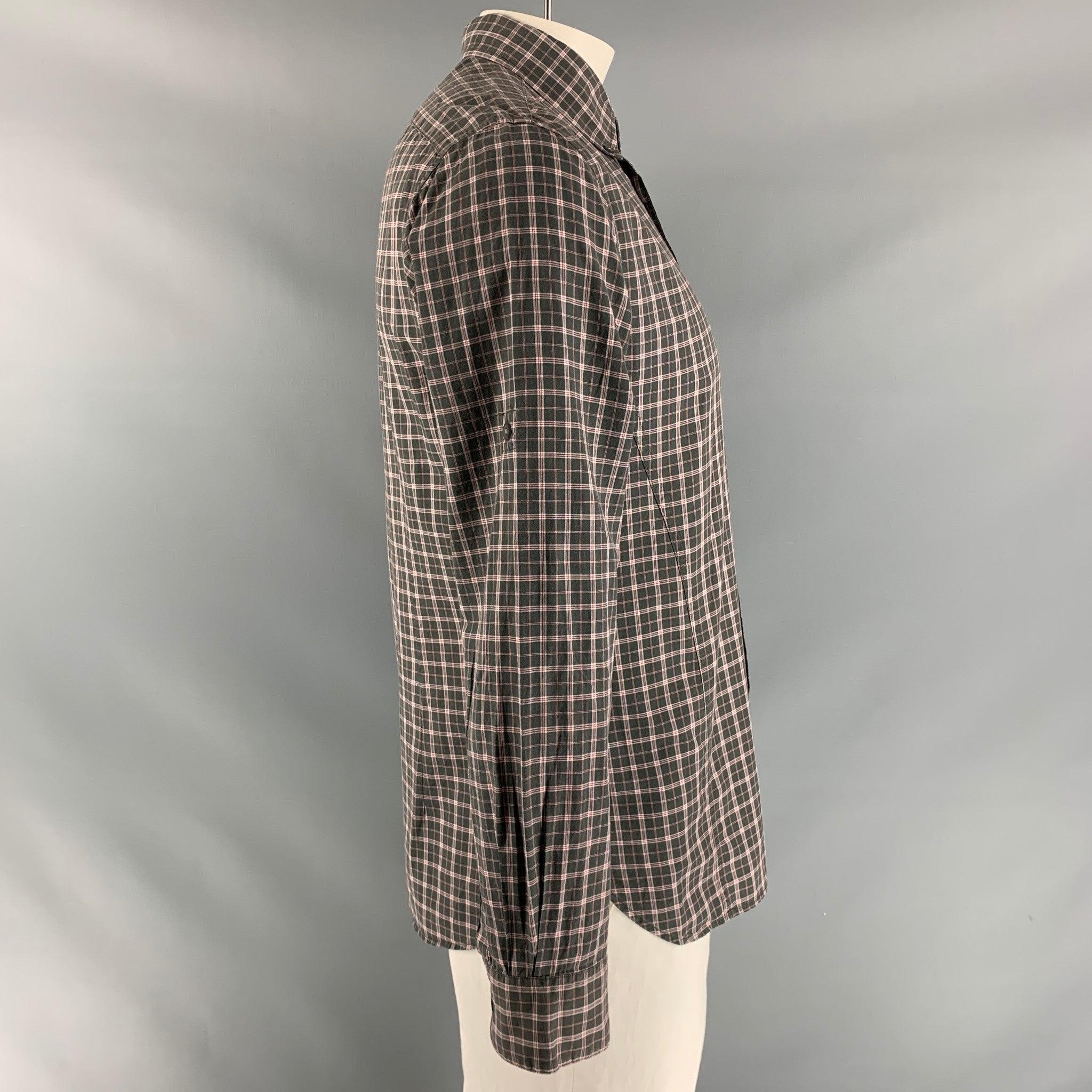 JOHN VARVATOS long sleeve shirt comes in charcoal and red plaid cotton featuring a patch pocket at left front panel, button down collar, one button round cuff, and button up closure. Excellent Pre-Owned Condition.  

Marked:   M 

Measurements: 
