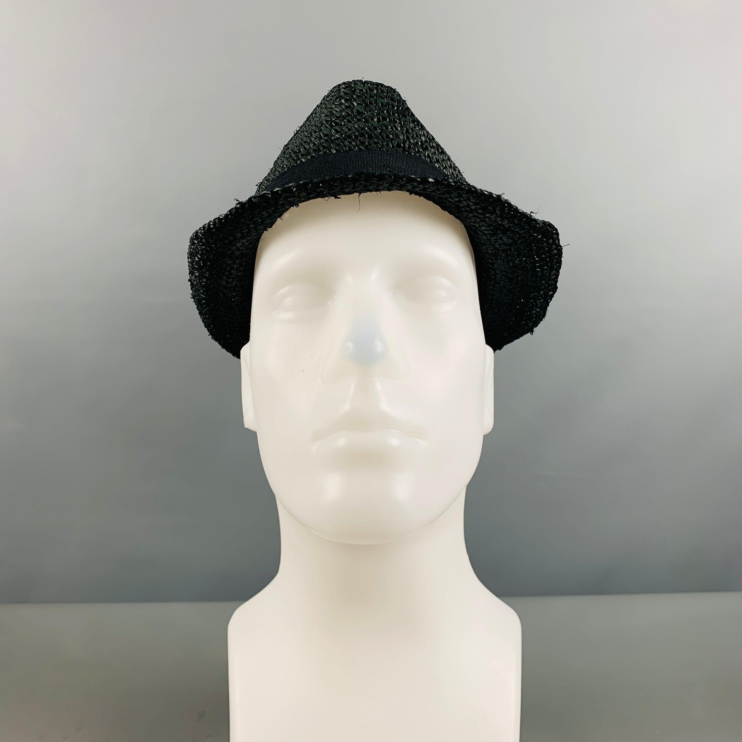 JOHN VARVATOS U.S.A hat comes in a black woven paper yarn material. Very Good Pre-Owned Condition. 

Marked:   S/M 

Measurements: 
  Opening: 22 inches Brim: 2 inches Height: 5 inches   
  
  
 
Reference No.: 129189
Category: Hats
More Details
   