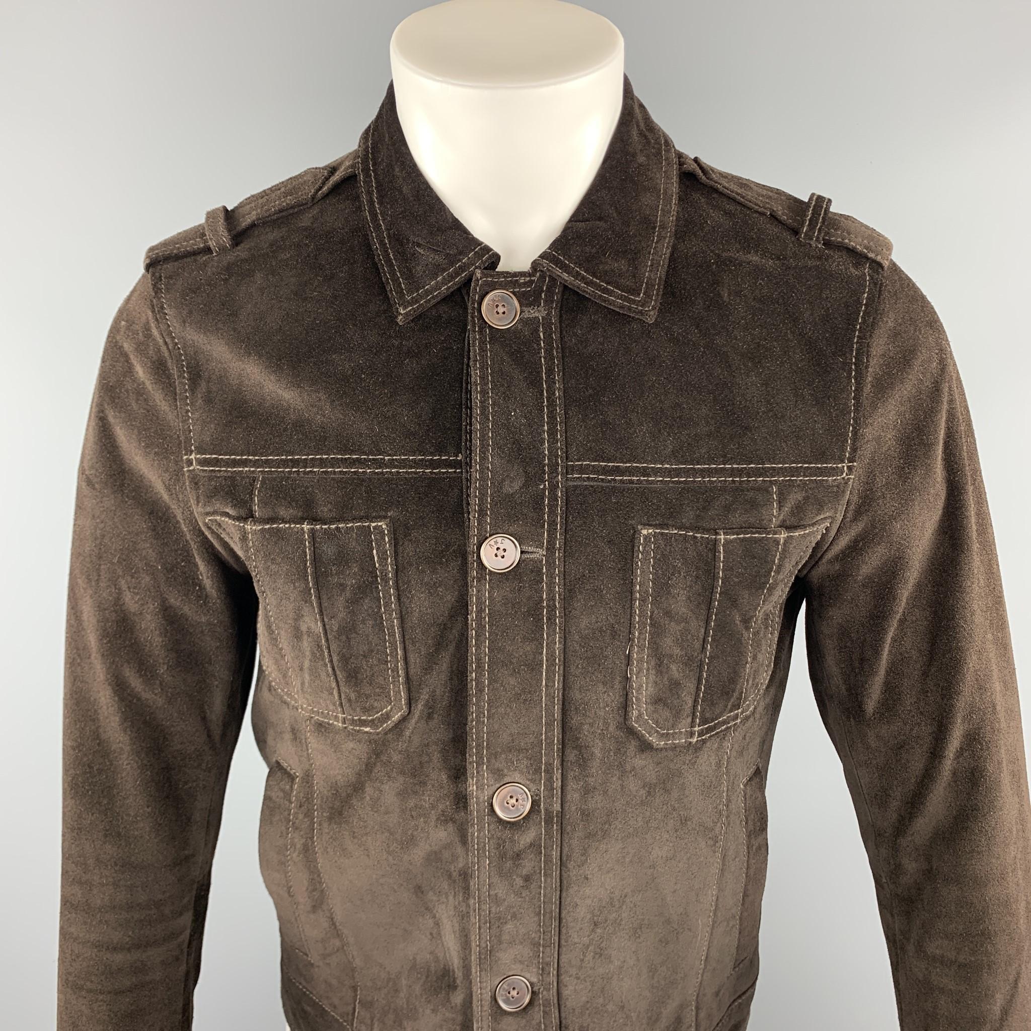 JOHN VARVATOS *U.S.A jacket comes in a brown suede leather featuring patch and slit pockets, contrast stitching, epaulettes, and a buttoned closure.

Very Good Pre-Owned Condition.
Marked: US S

Measurements:

Shoulder: 15.5 in. 
Chest: 36 in.