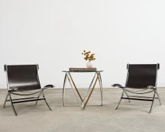 John Vesey Tavolino in ottone e acciaio con piano in vetro