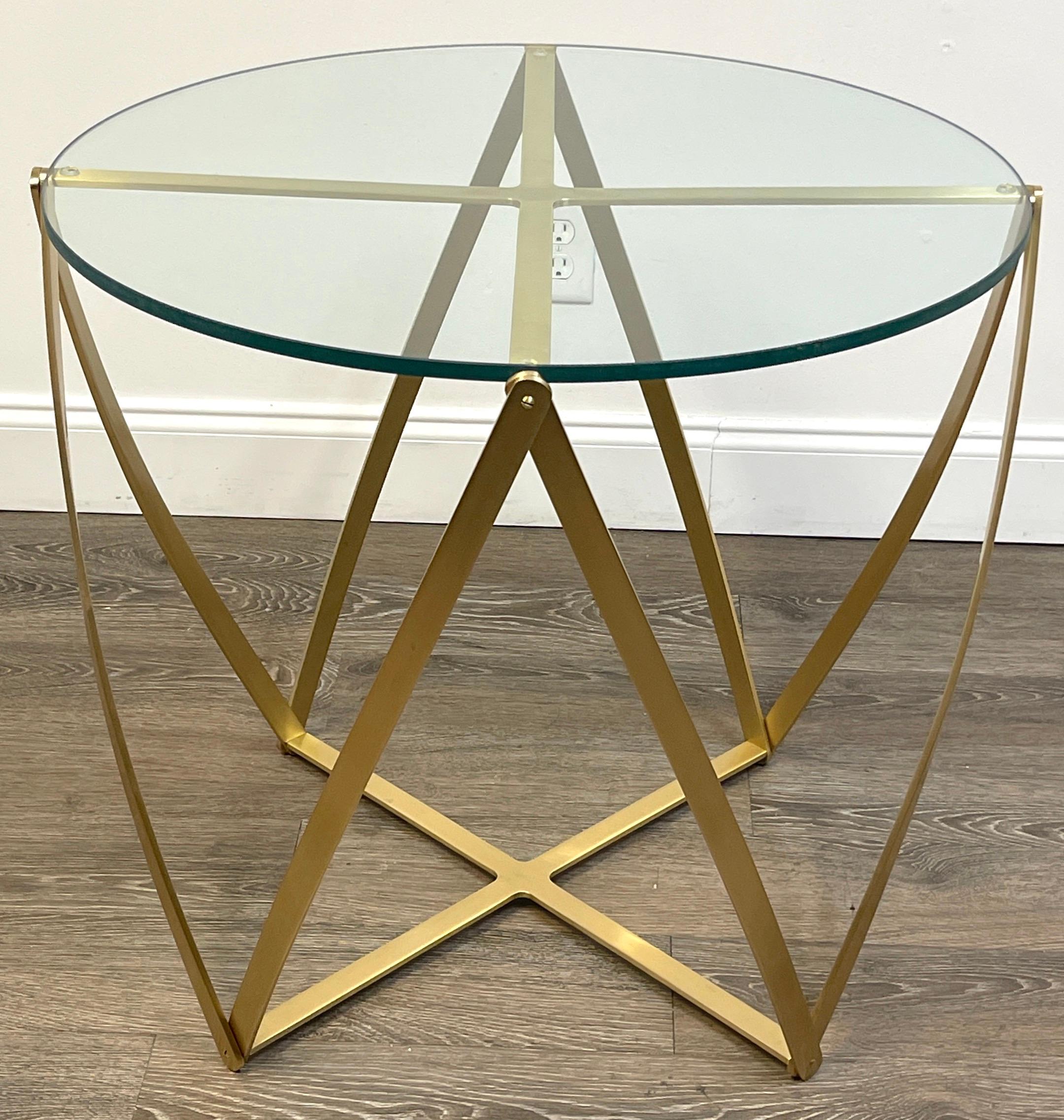 John Vesey brass geometric table.
USA, Circa 1960s.
A fine and large example, of his iconic 'spool' table. Precision craftsmanship, with inset and removable glass top. 

