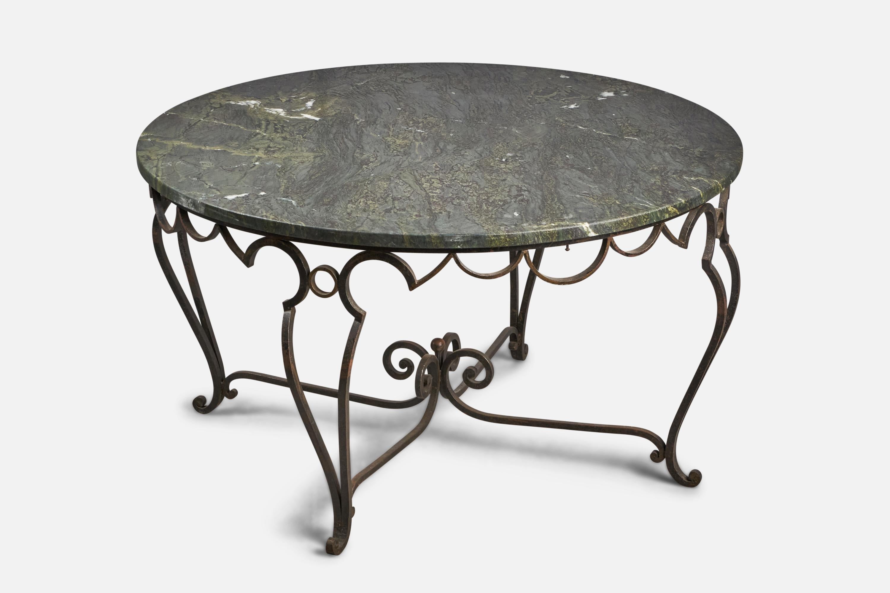 A sizeable black-painted wrought iron and marble center table designed and produced by John Vesey, USA, c. 1950s.