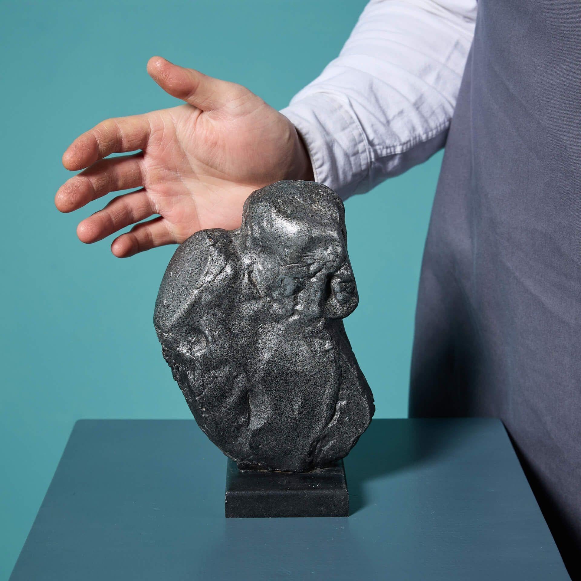 An abstract patinated composite clay sculptural maquette, likely unique, by the acclaimed British sculptor, John W. Mills, for a bust of the Italian renaissance sculptor, Michelangelo.

It's abstract nature showcases the sculptor's crafting process