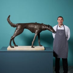 John W. Mills (1933-2023) Large Dog Sculpture on Limestone Base