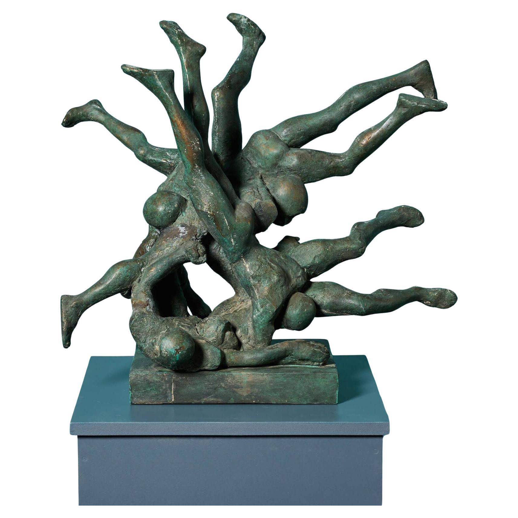 John W. Mills (1933-2023) '¡Tackle! Escultura de futbolistas americanos