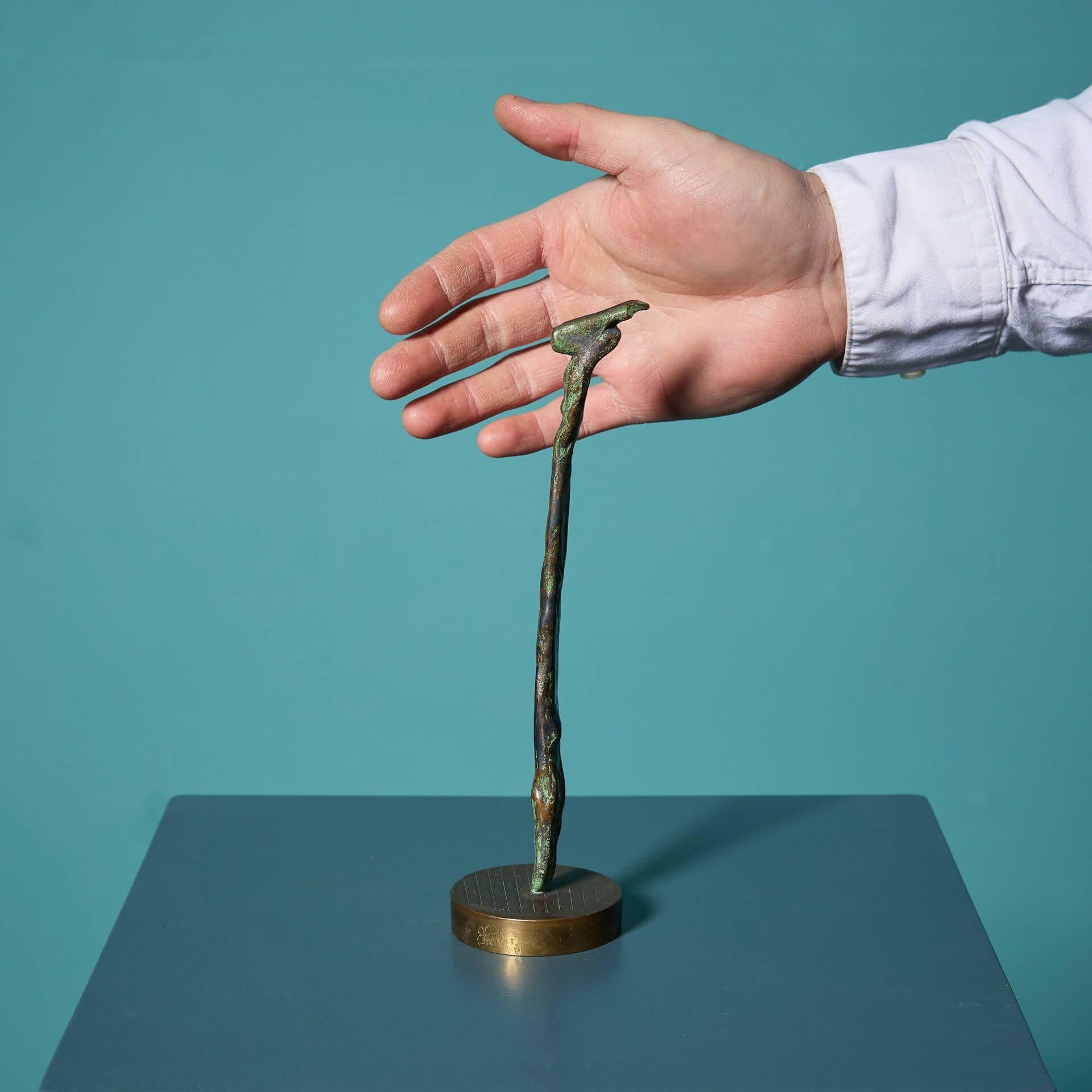 A fascinating unique patinated bronze tabletop sculpture of a diver by the acclaimed British sculptor, John W. Mills. Signed to the base by the artist and marked ‘1/1’.

Part of the divers in motion series, this bronze is mounted on a circular