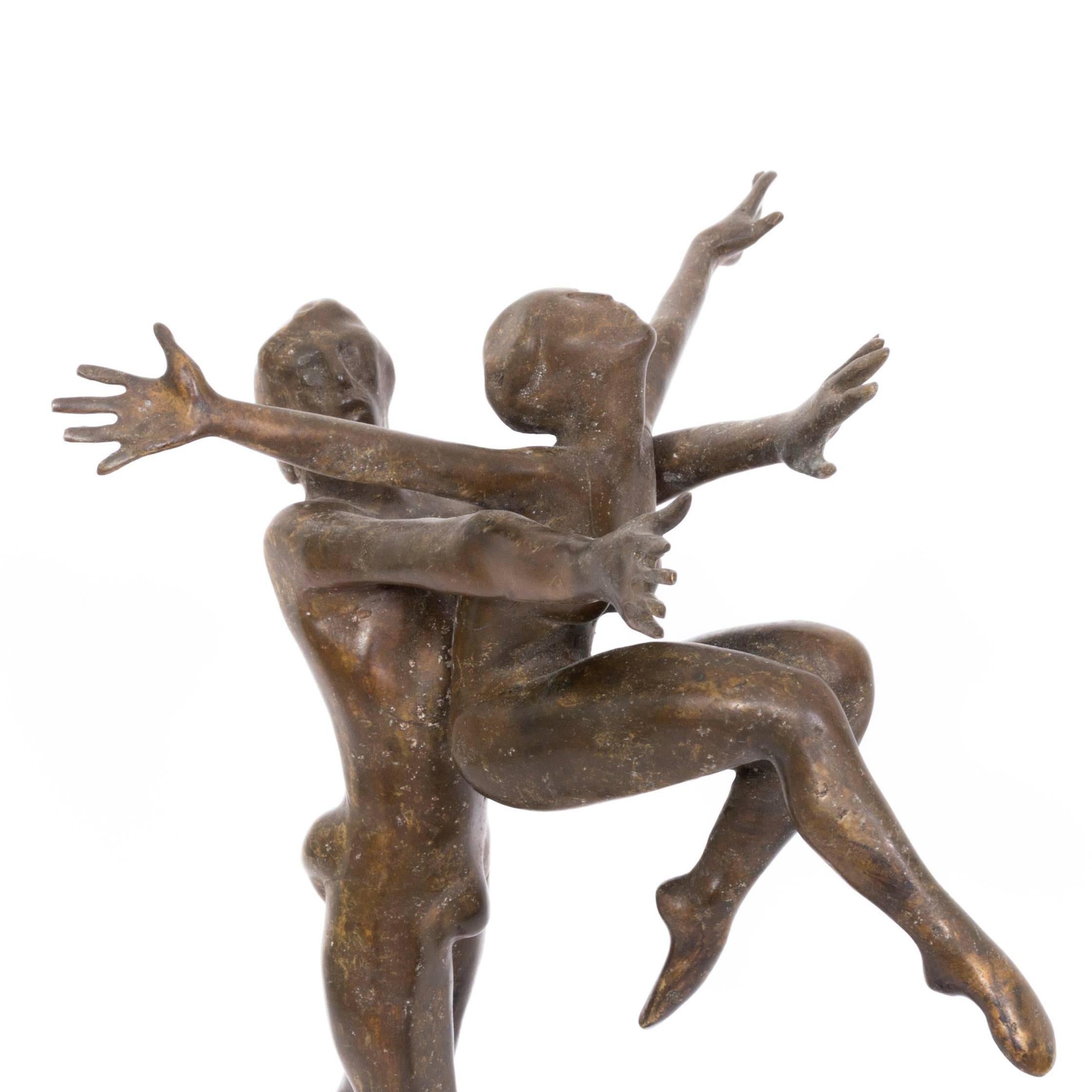This extraordinary elegant bronze figure  of the series 