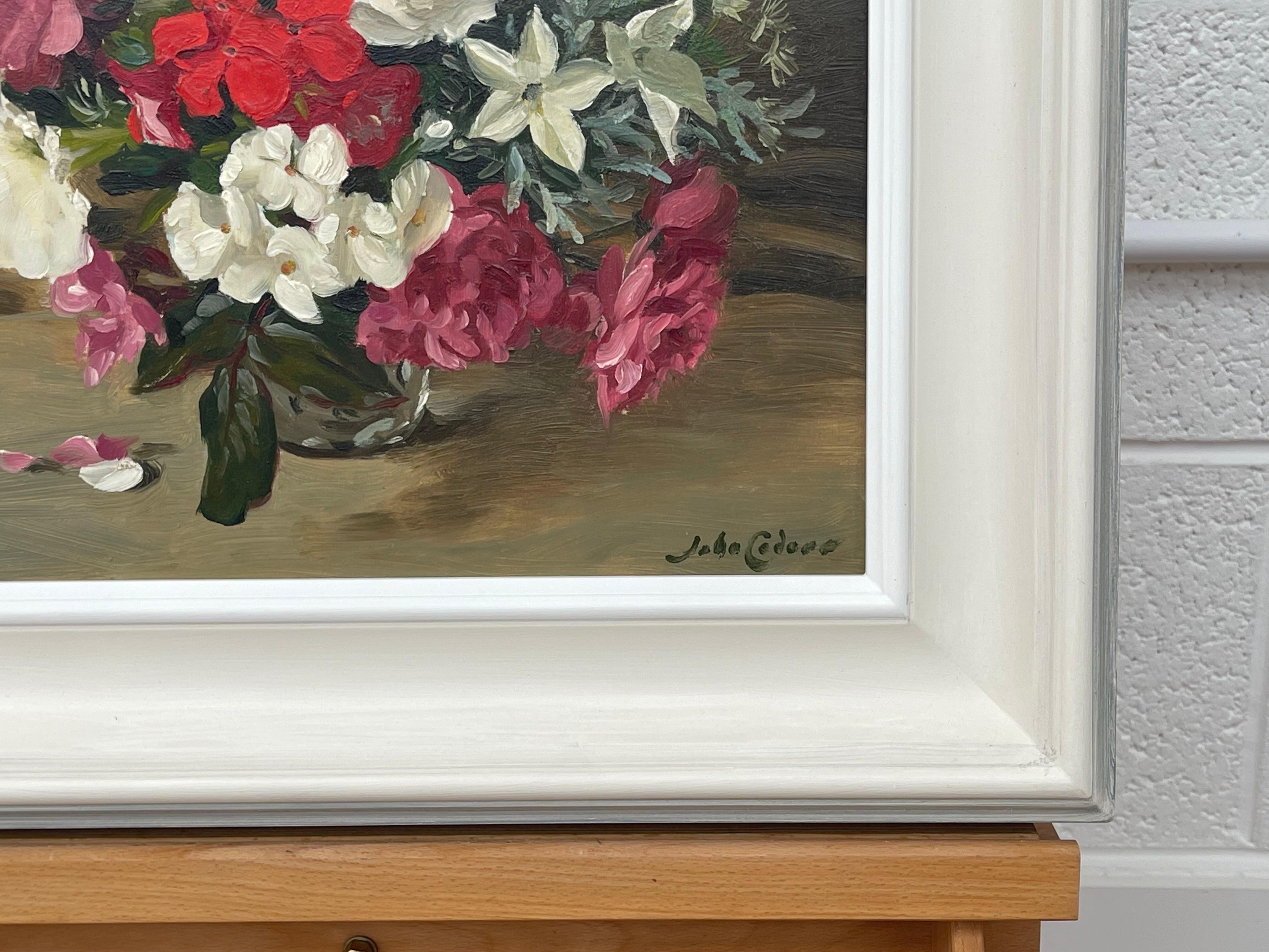 Still Life Oil Painting of Assorted Red, Pink & White Summer Flowers in a Vase by 20th Century British Artist, John Whitlock Codner RWA (1913-2008) 

Art measures 14 x 12 inches
Frame measures 20 x 18 inches 

Presented in the highest quality
