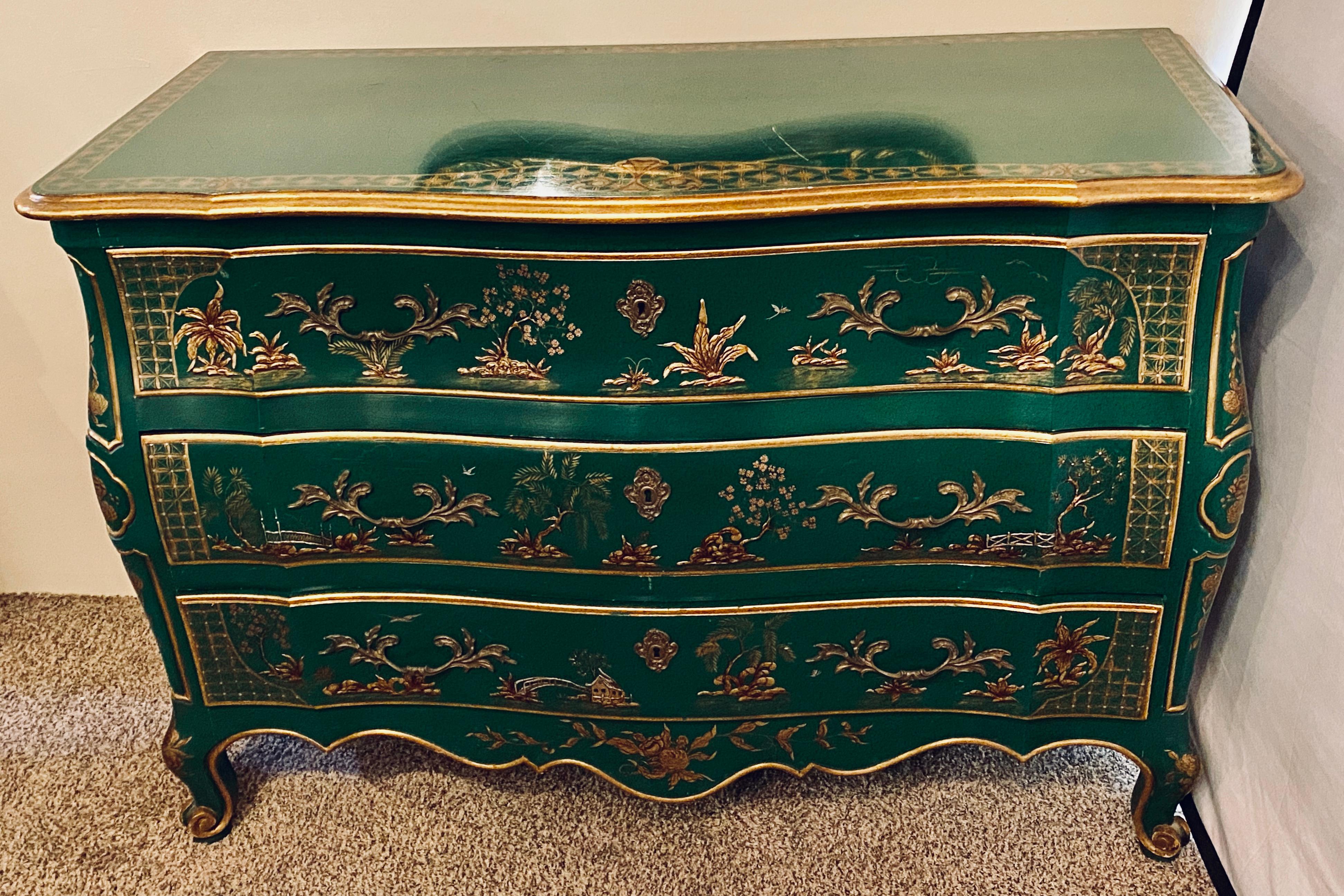 John Widdicomb Bombay chinoiserie paint decorated commode chest with raised carvings and figures.
GXA.