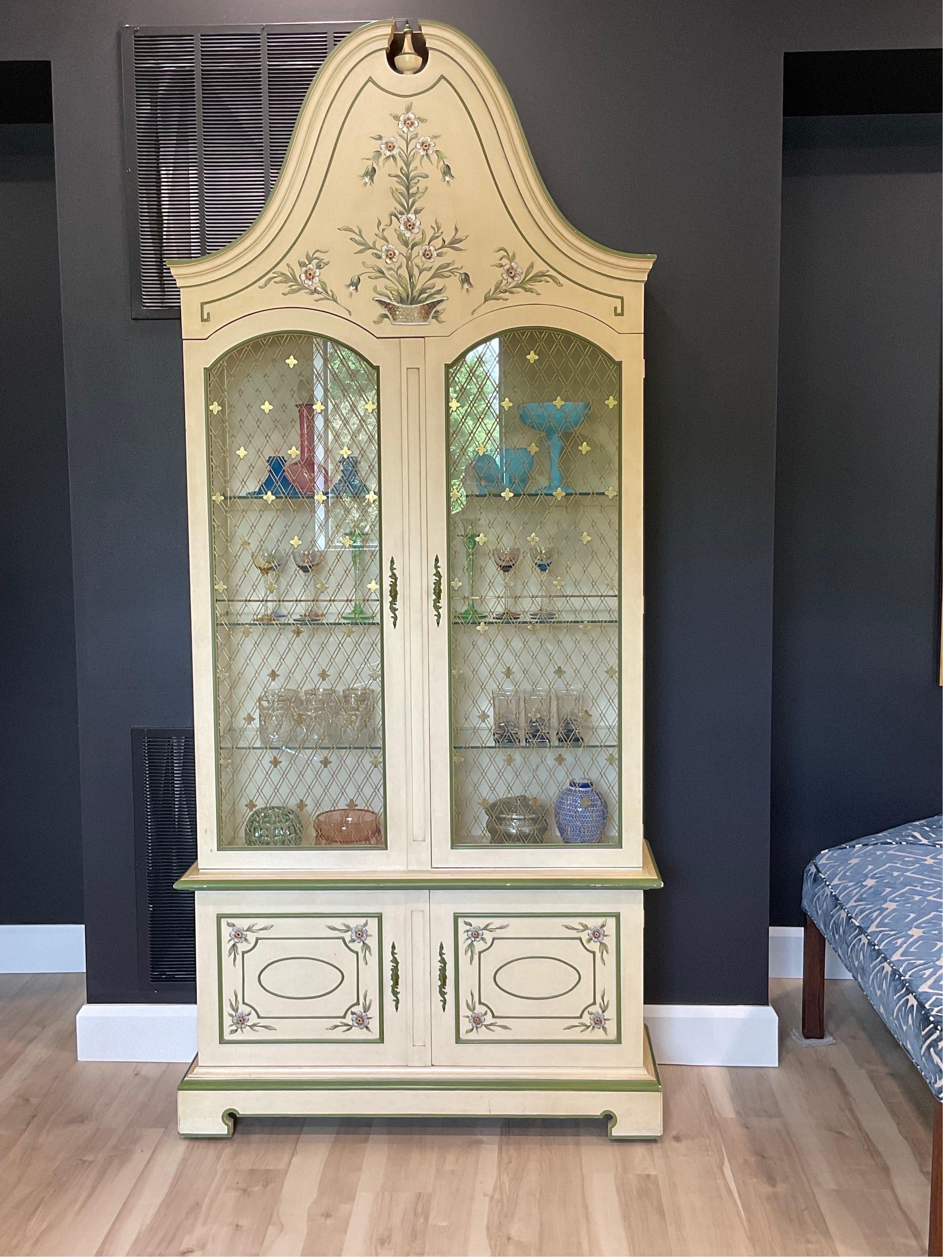 Very Rare John Widdicomb Bonnet top cabinet with glass shelving. Beautiful hand painted details, intricate brass grating and hand carvings. Original Finish. Beautiful piece of Widdicomb history, Circa 1960's. Fine Vintage condition with minimal