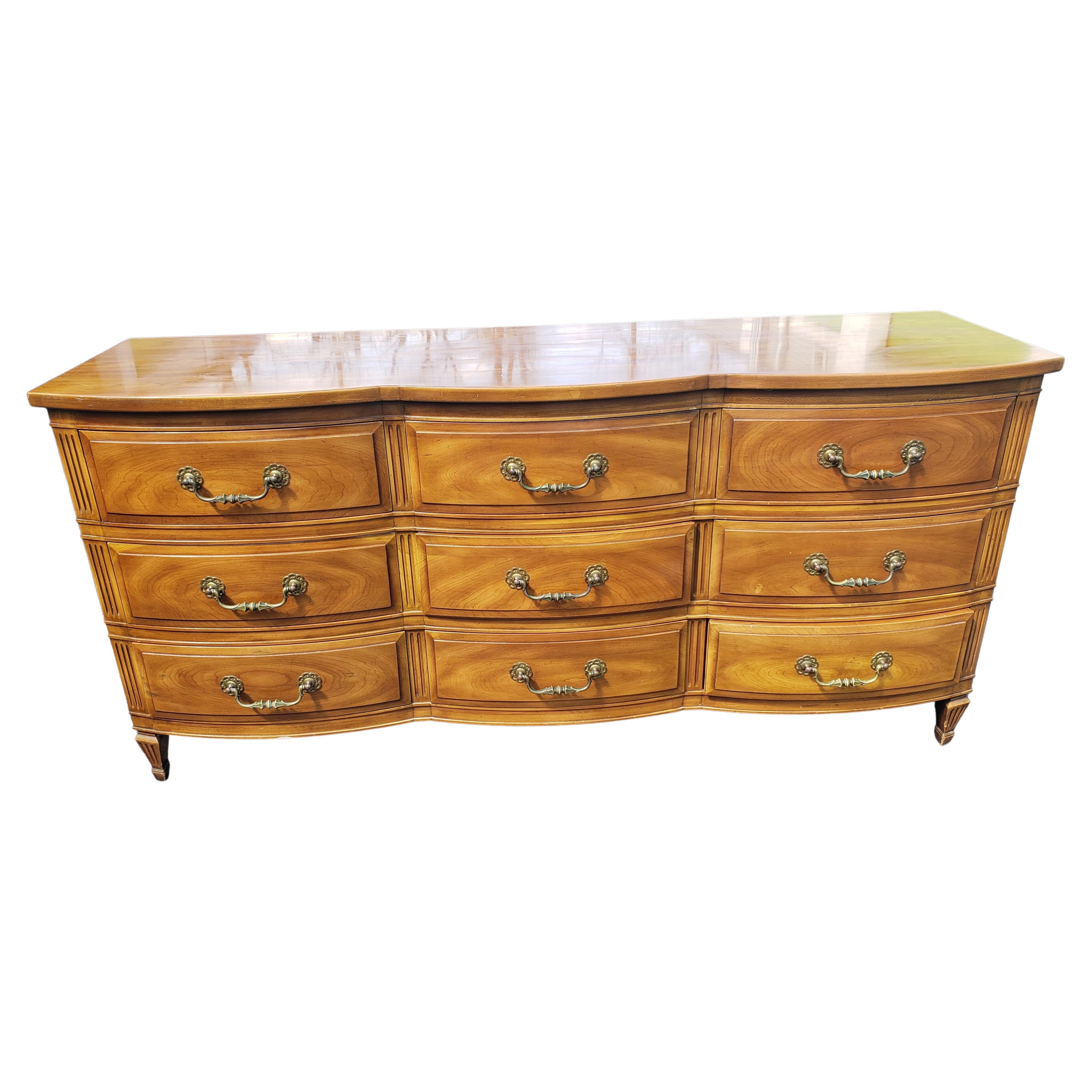 Fruitwood John Widdicomb French Country Serpentine Dresser with Glass Top, circa 1950s For Sale