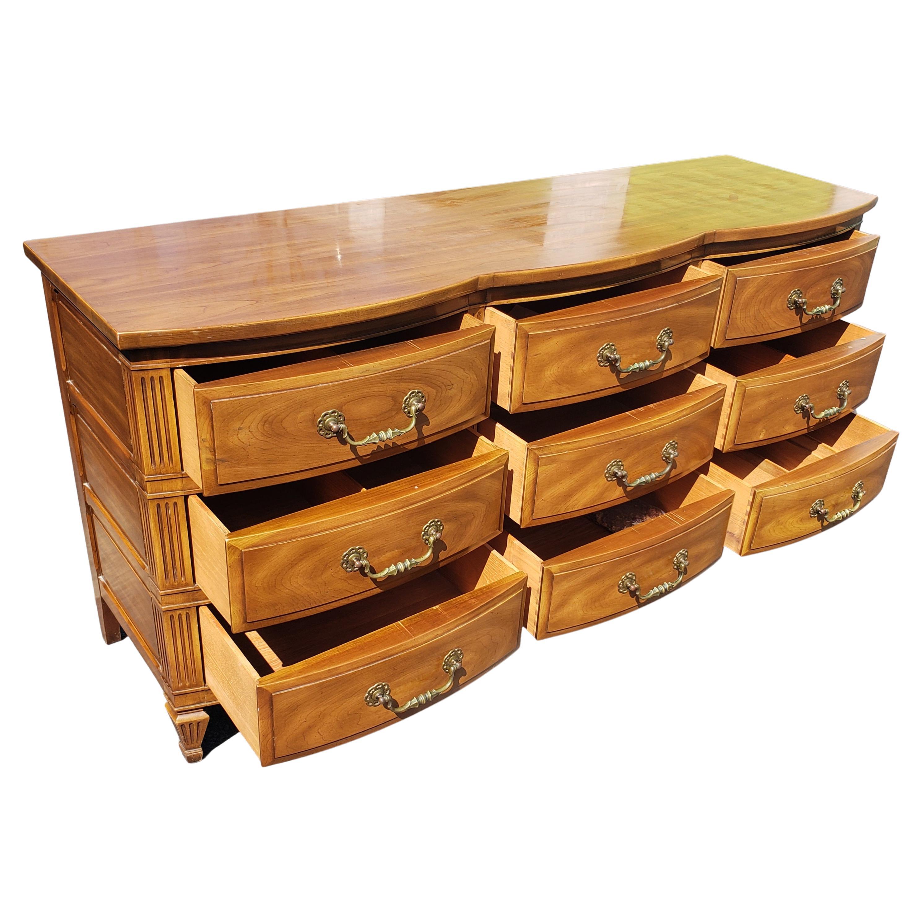 American John Widdicomb French Country Serpentine Dresser with Glass Top, circa 1950s For Sale