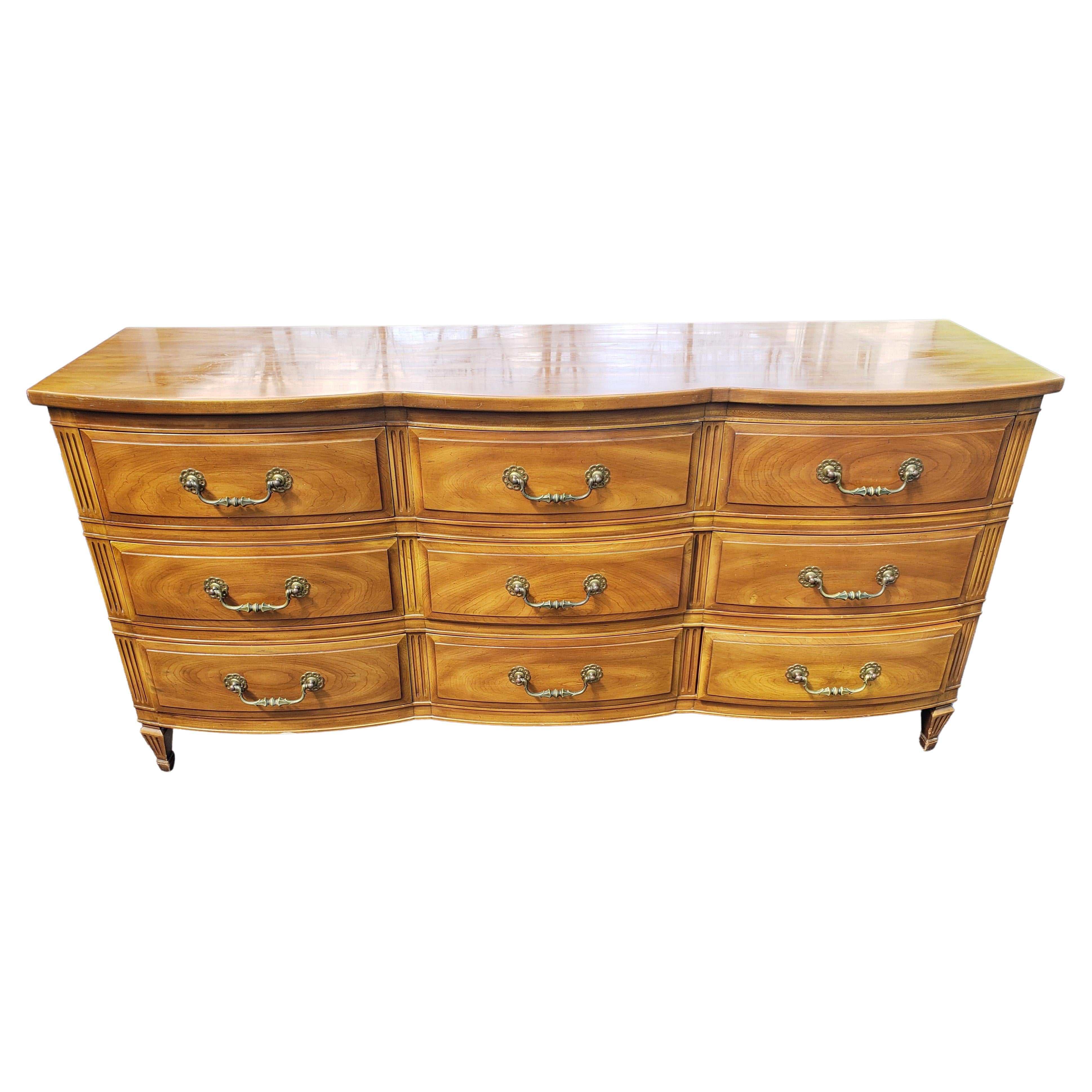 John Widdicomb French Country Serpentine Dresser with Glass Top, circa 1950s For Sale